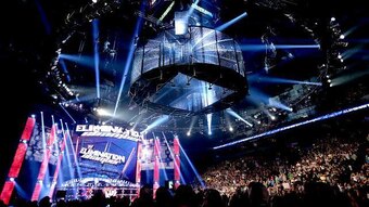 The Elimination Chamber descends from the ceiling.