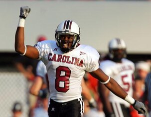 ATHENS, GA - SEPTEMBER 10:  Fred Bennett #8 of the South Carolina Gamecocks celebrates after his teammate Jonathan Joseph #9 intercepted a ball for a touchdown during their game against the Georgia Bulldogs at Sanford Stadium on September 10, 2005 in Athe