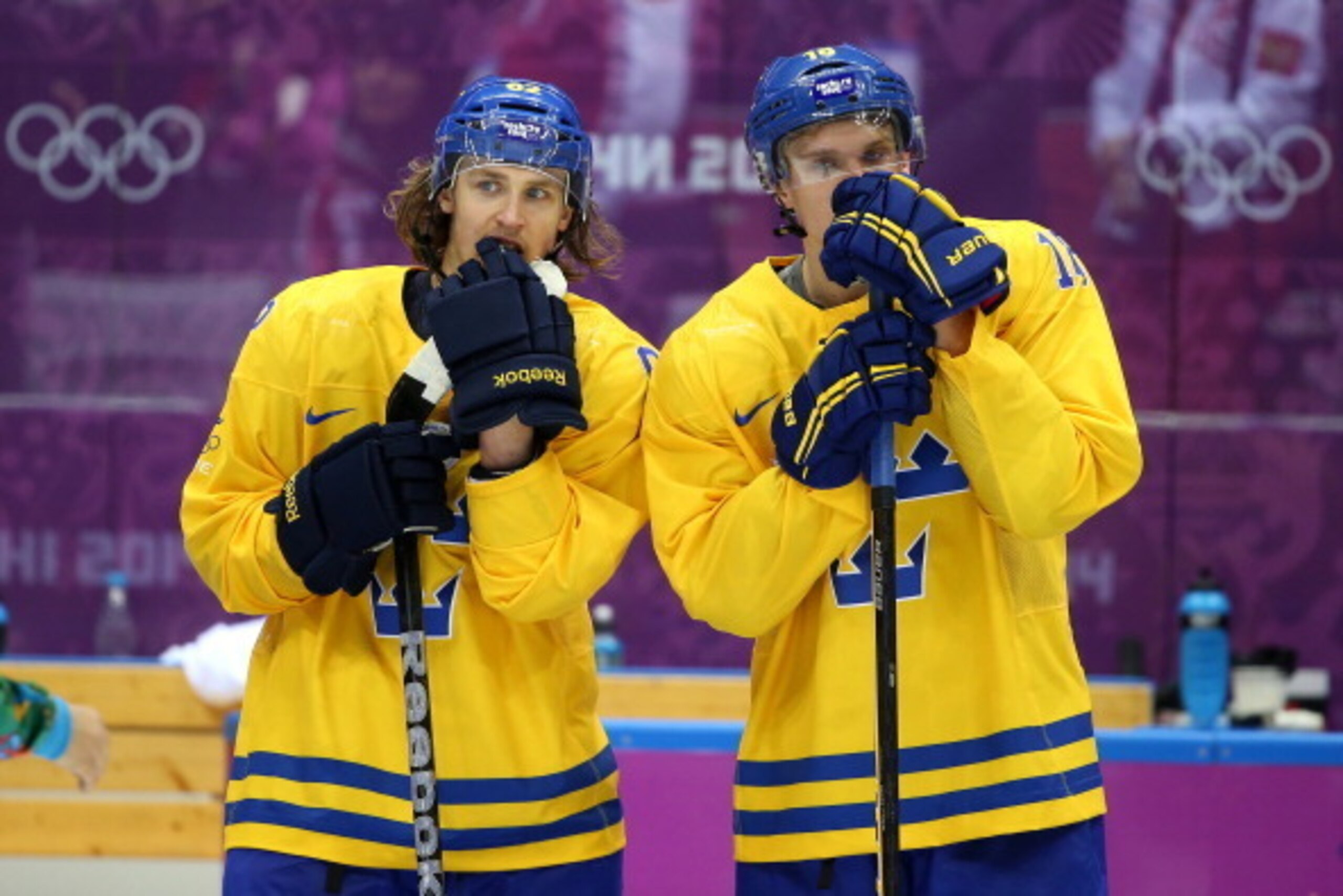 SOCHI, RUSSIA - FEBRUARY 23:  Carl Hagelin #62 and Jakob Silfverberg #18 of Sweden react after losing 3-0 to Canada during the Men's Ice Hockey Gold Medal match on Day 16 of the 2014 Sochi Winter Olympics at Bolshoy Ice Dome on February 23, 2014 in Sochi,