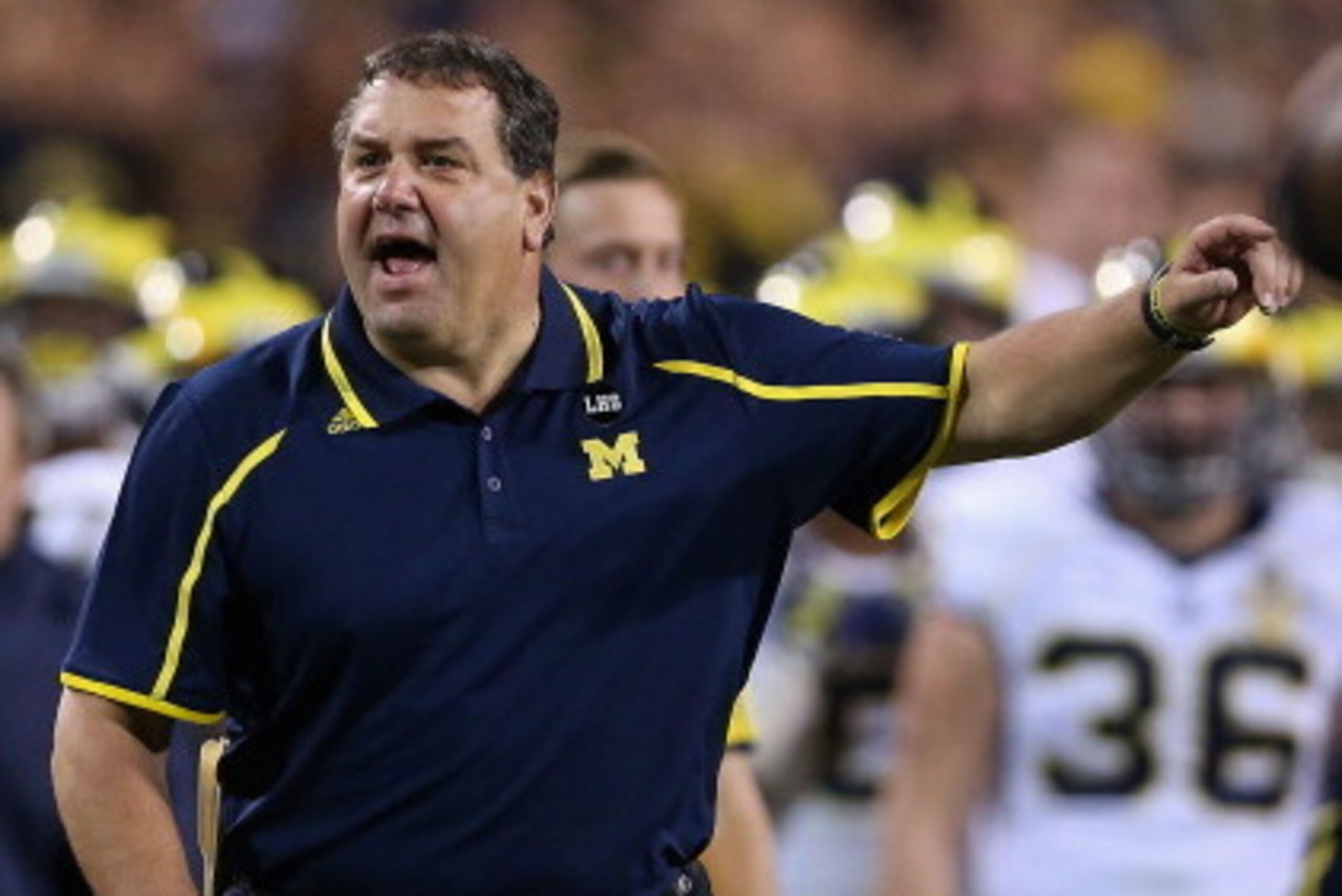 Urban Meyer and Brady Hoke
