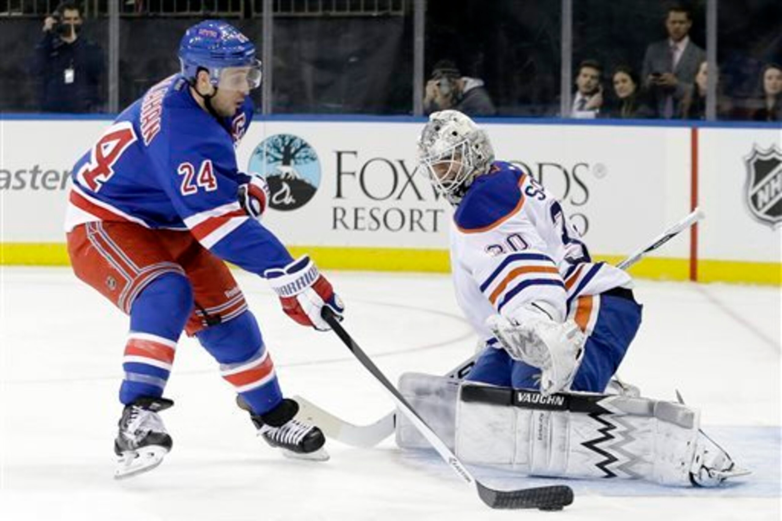 New York Rangers Forward Ryan Callahan in alone on Edmonton Oilers goalie Ben Scrivens. New York Rangers Forward Ryan Callahan in alone on Edmonton Oilers goalie Ben Scrivens.