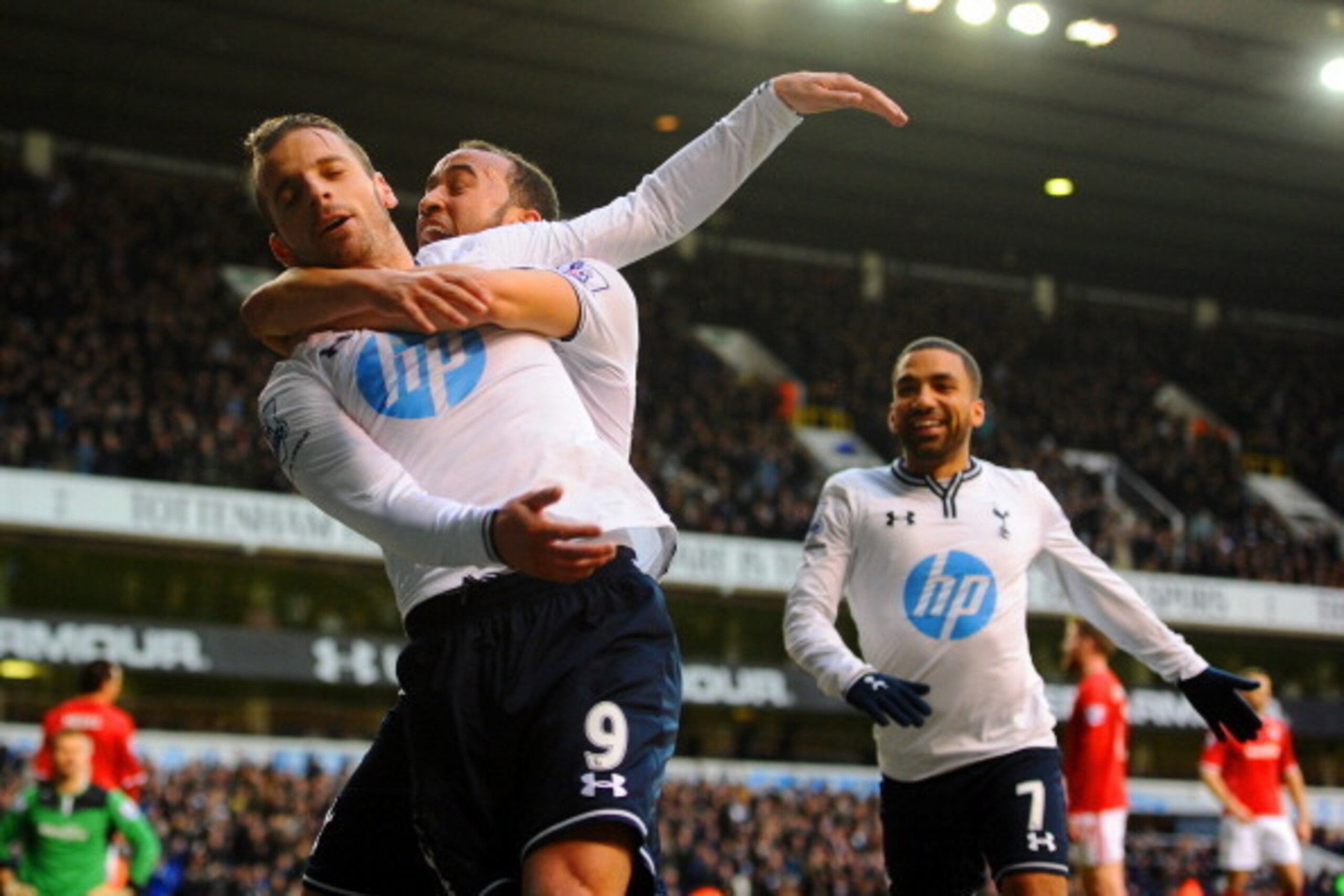 Sweet relief for Soldado: The Tottenham striker is congratulated by his teammates after scoring what proved to be the winner against Cardiff.