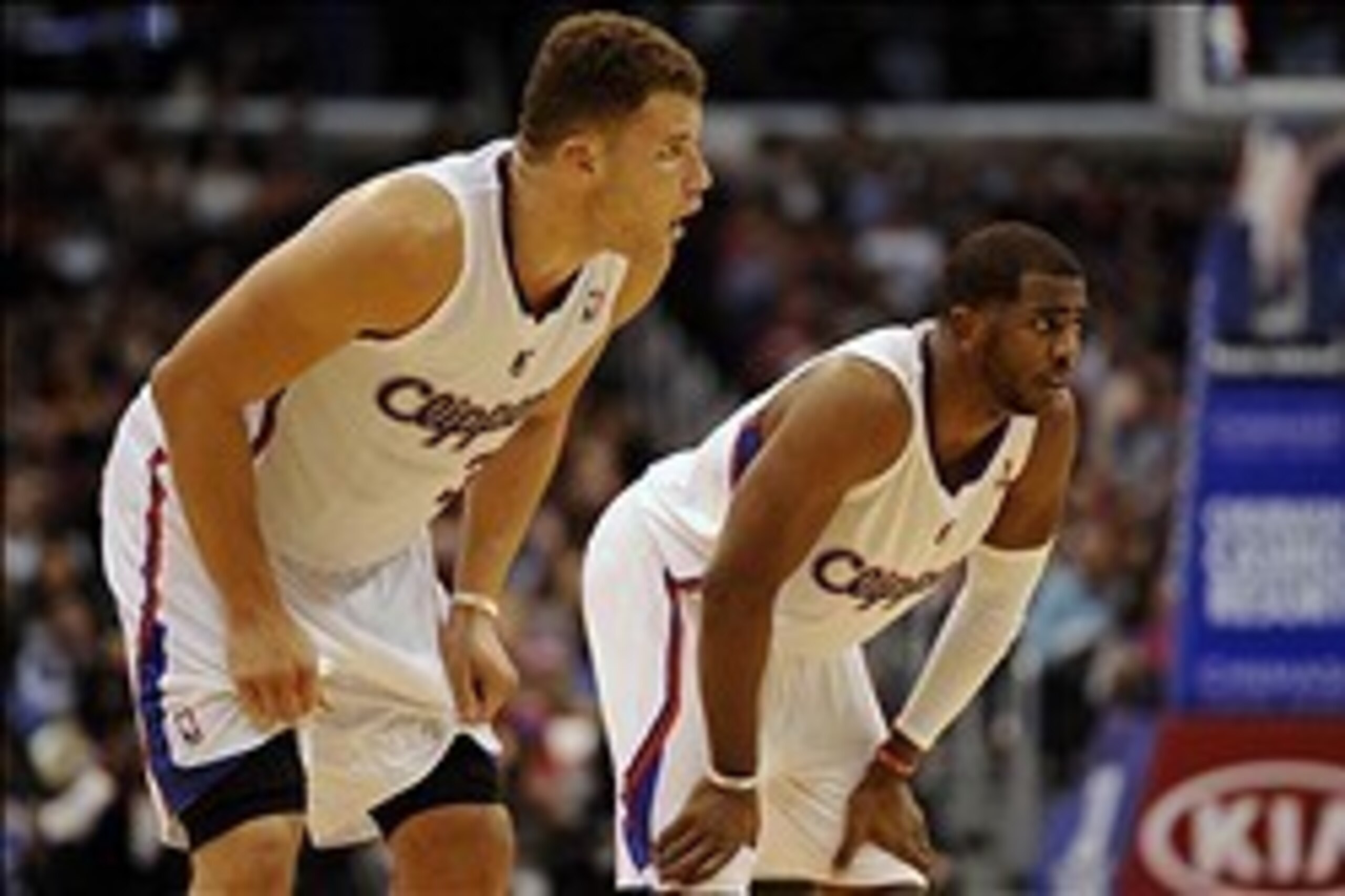 Dec 28, 2013; Los Angeles, CA, USA; Los Angeles Clippers guard Chris Paul (3) and Los Angeles Clippers forward Blake Griffin (32) rest during a break in play against the Utah Jazz during the fourth period at Staples Center. The Los Angeles Clippers defeat Dec 28, 2013; Los Angeles, CA, USA; Los Angeles Clippers guard Chris Paul (3) and Los Angeles Clippers forward Blake Griffin (32) rest during a break in play against the Utah Jazz during the fourth period at Staples Center. The Los Angeles Clippers defeat