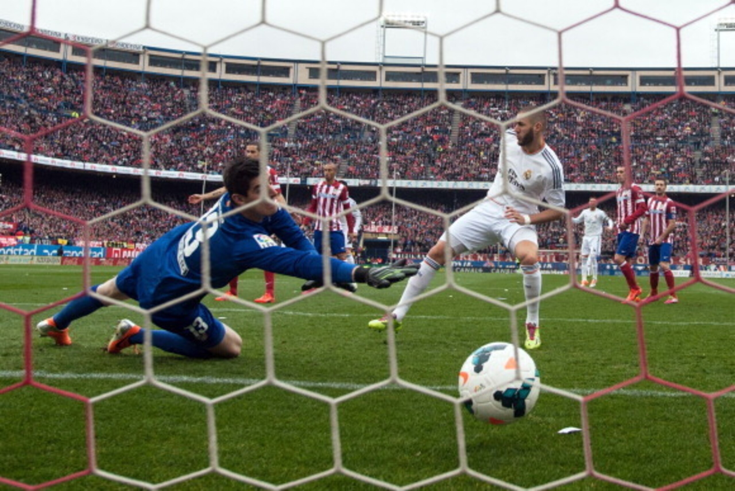 On target: Karim Benzema opened the scoring.