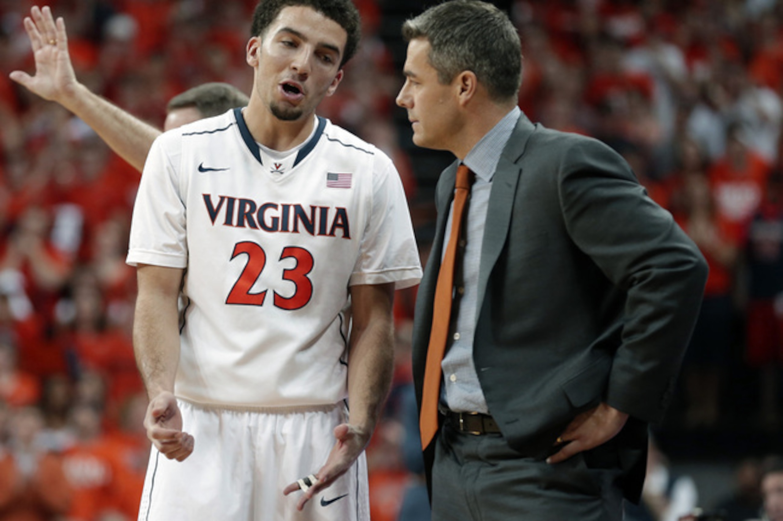 Virginia head coach Tony Bennett and London Perrantes.