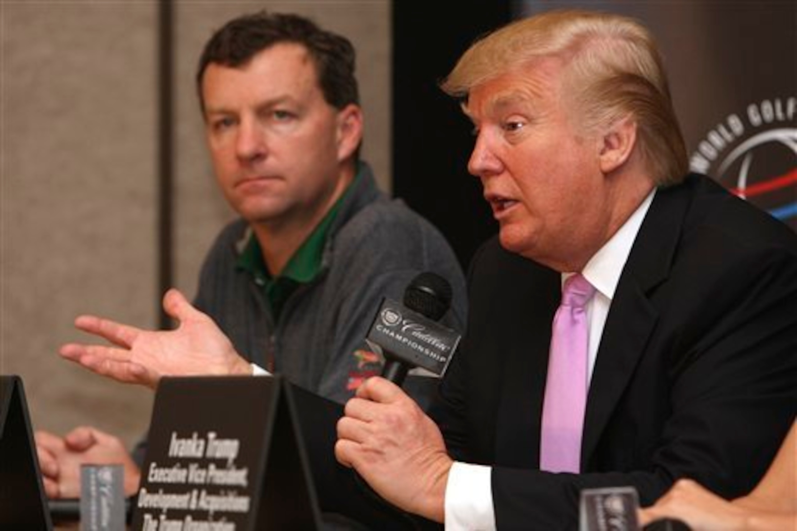 Gil Hanse (left) and Donald Trump discuss the new Doral.