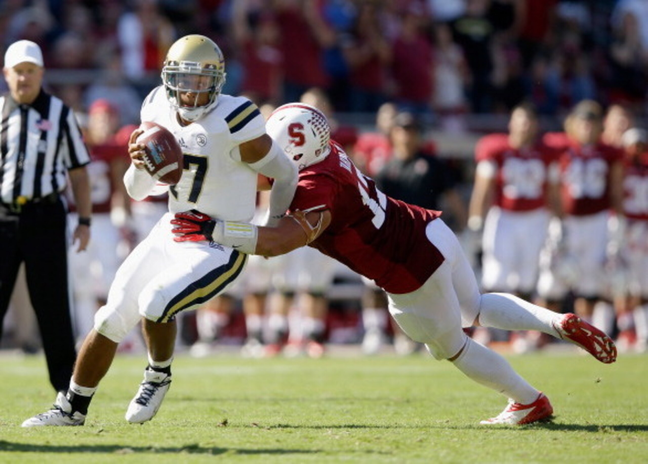 Stanford's A.J. Tarpley wraps up UCLA's Brett Hundley.