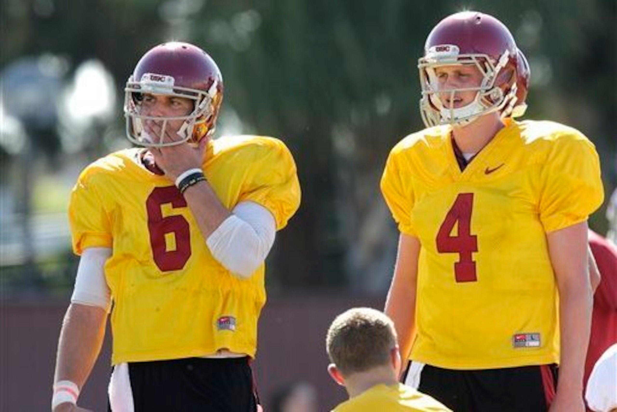 New USC coach Steve Sarkisian might opt to go with redshirt freshman Max Browne (right) over returning starter Cody Kessler at quarterback. New USC coach Steve Sarkisian might opt to go with redshirt freshman Max Browne (right) over returning starter Cody Kessler at quarterback.