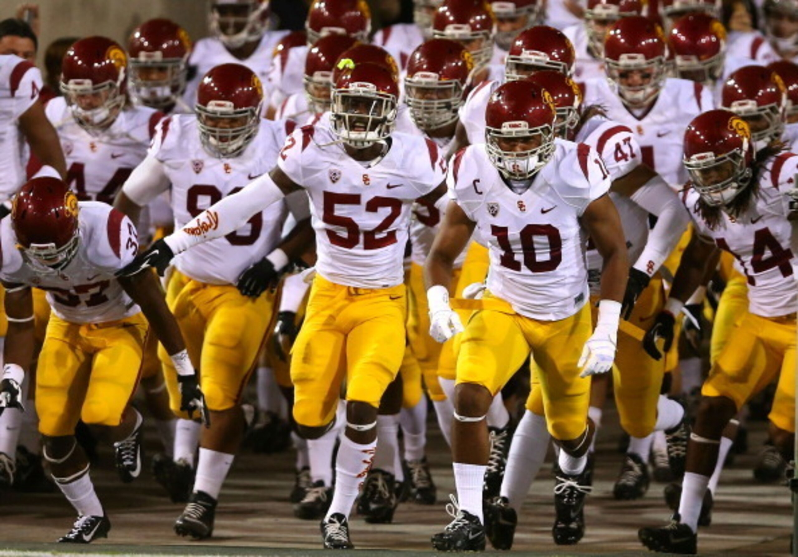 Quinton Powell (No. 52) and a handful of other Trojans have new numbers for 2014. Quinton Powell (No. 52) and a handful of other Trojans have new numbers for 2014.