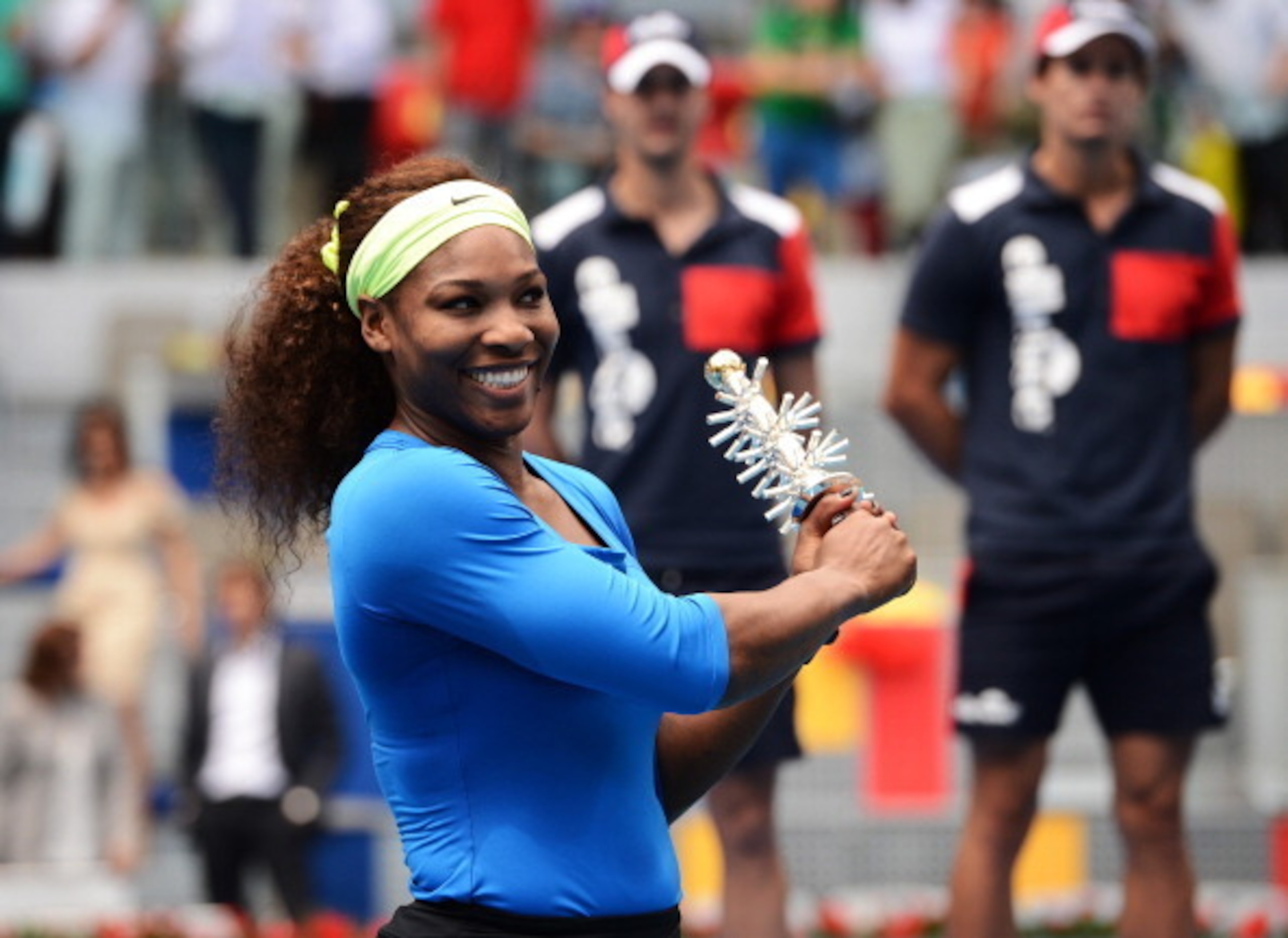 Serena Williams holds the trophy for the Madrid Open like it's a self-defense weapon. Serena Williams holds the trophy for the Madrid Open like it's a self-defense weapon.