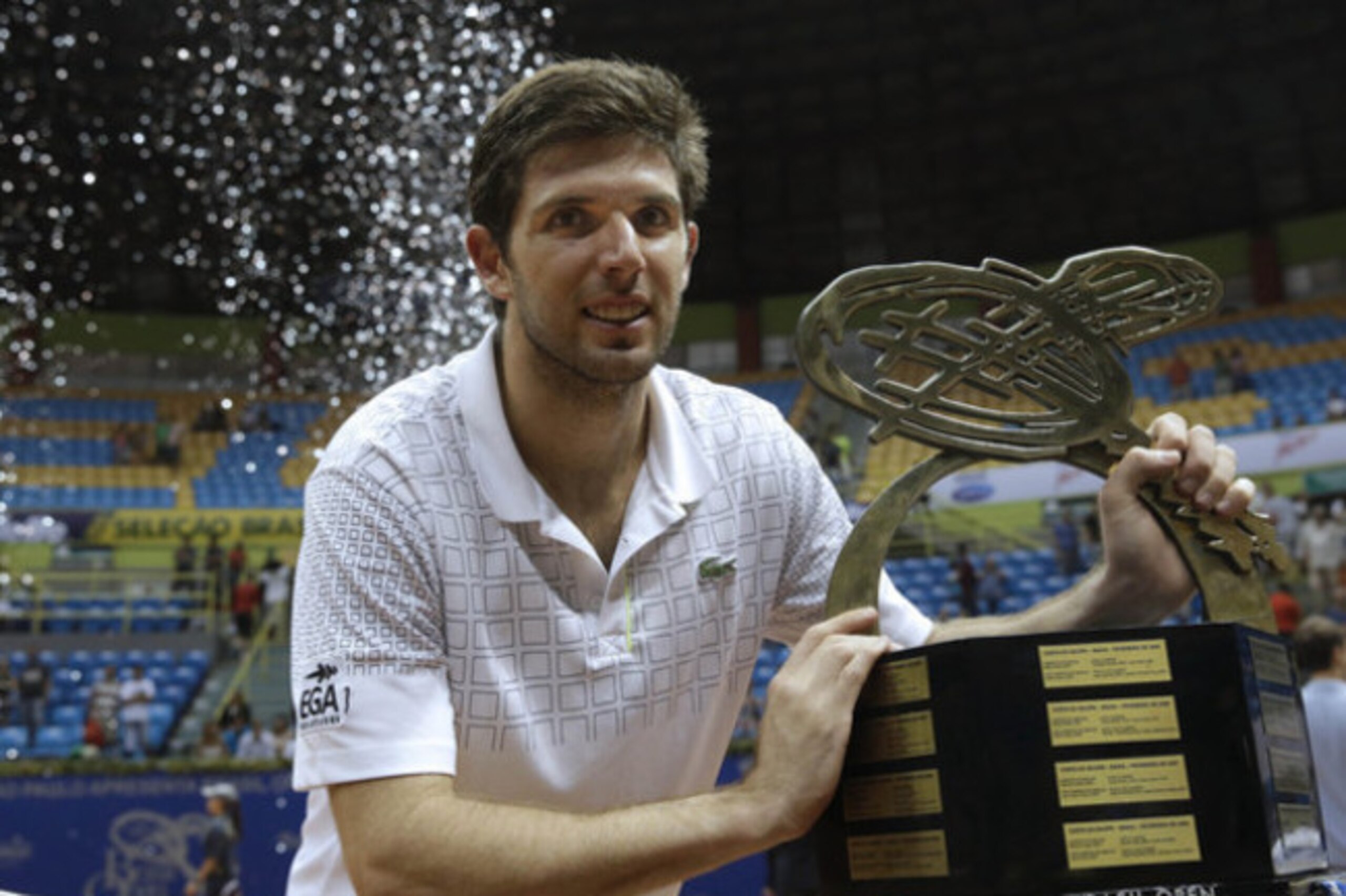 Federico Delbonis with the trophy at Brasil Open 2014. Federico Delbonis with the trophy at Brasil Open 2014.