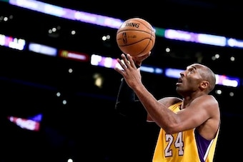 Kobe Bryant of the L.A. Lakers waits to get into the game. Kobe Bryant of the L.A. Lakers waits to get into the game.