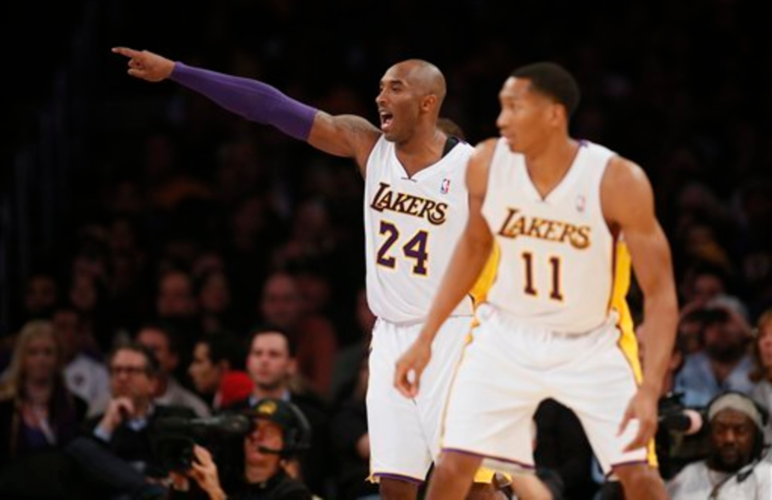 Kobe Bryant gives out instructions.