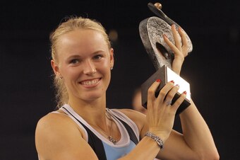 Caroline Wozniacki holds the trophy in Luxembourg 2013.