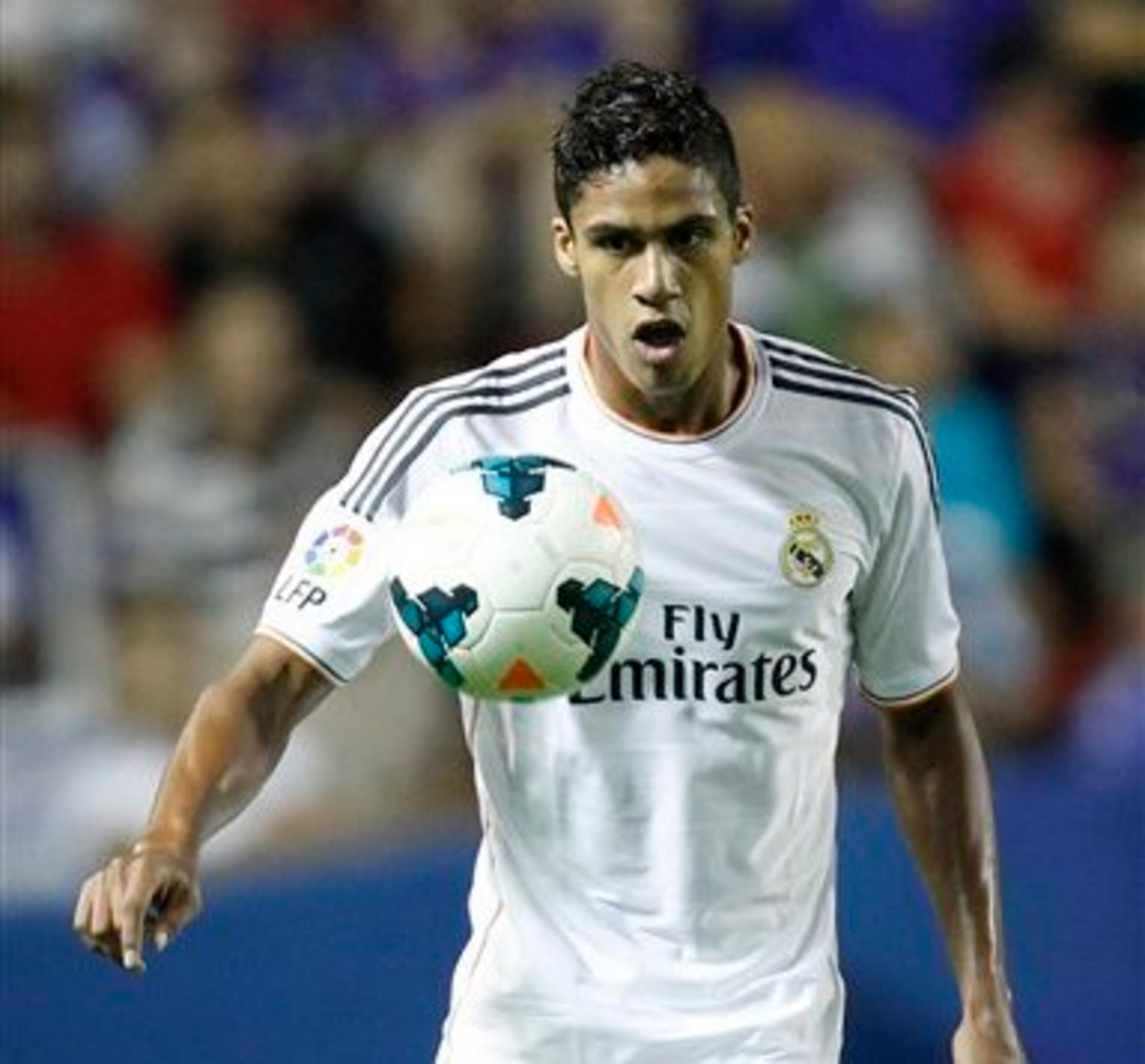 Subbed: Raphael Varane took a knock to his knee.