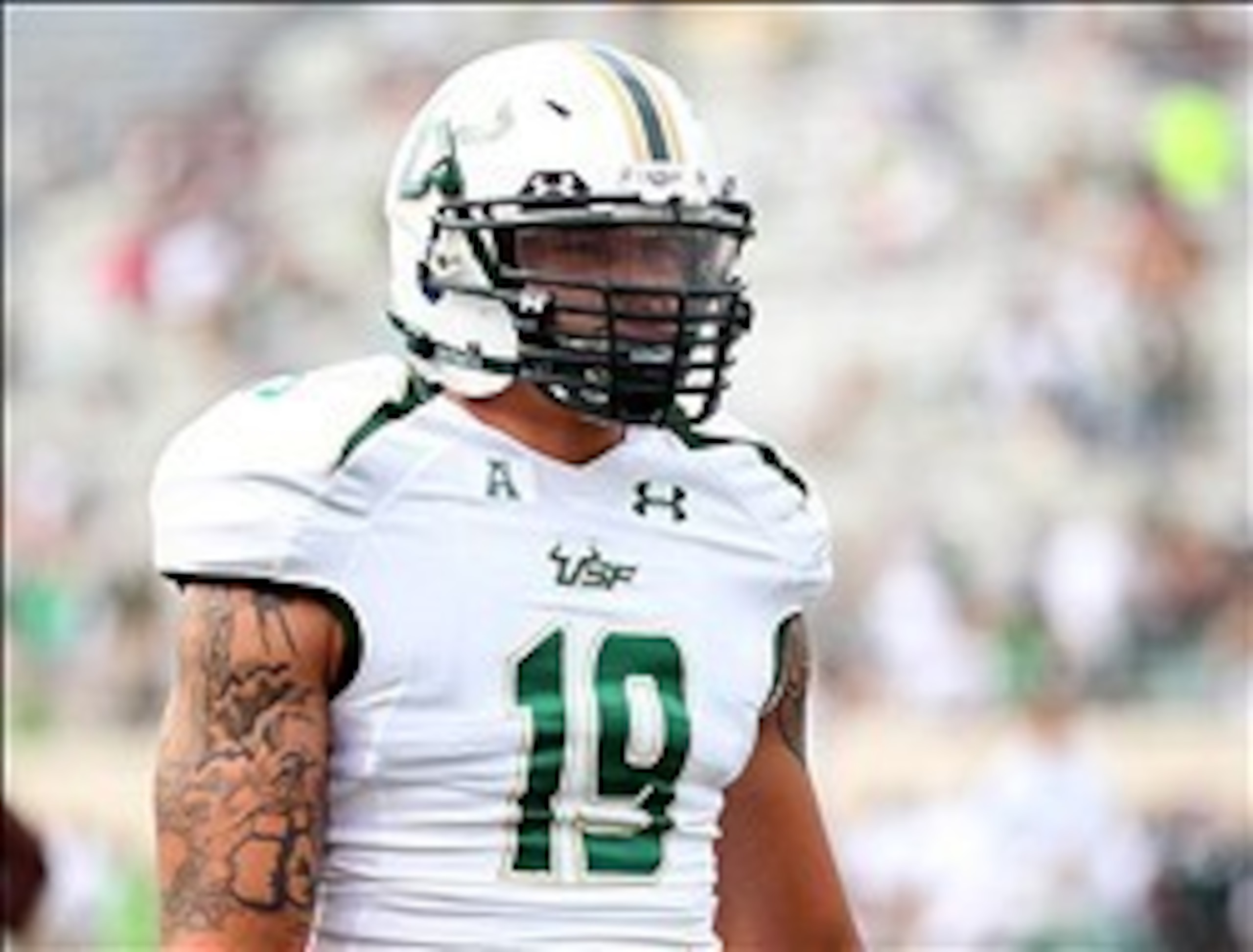 Sep 7, 2013; East Lansing, MI, USA; South Florida Bulls defensive lineman Aaron Lynch (19) warms up prior to a game  at Spartan Stadium. Mandatory Credit: Mike Carter-USA TODAY Sports