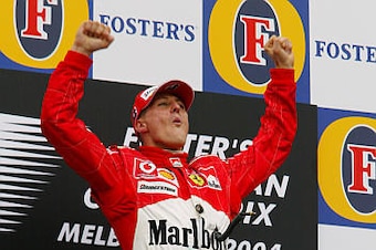 Schumacher celebrates his victory at the 2004 Australian Grand Prix. Schumacher celebrates his victory at the 2004 Australian Grand Prix.