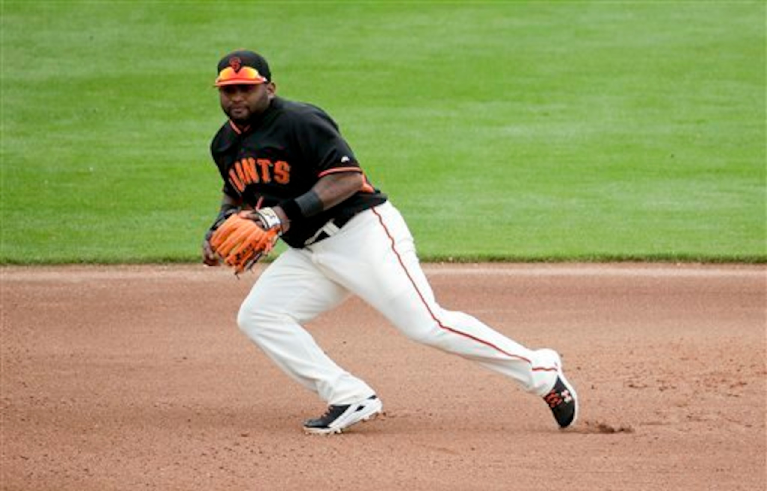 Pablo Sandoval reported to camp after losing about 30 pounds this offseason.