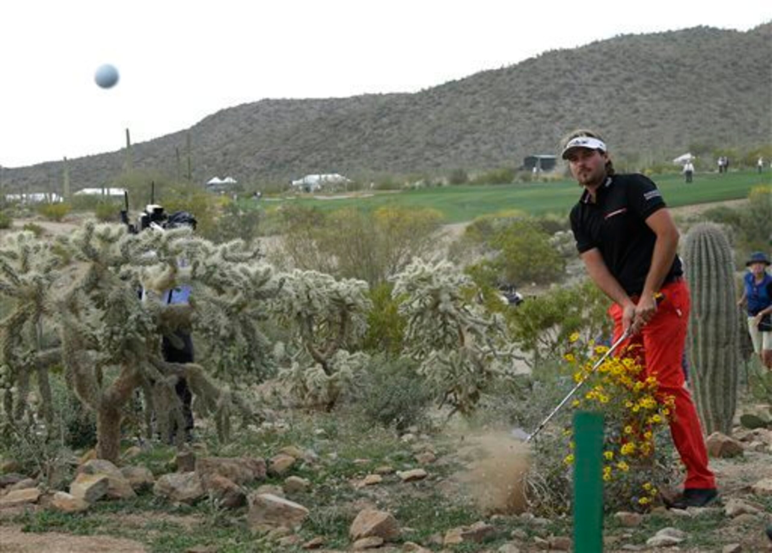 Dubuisson gets the ball airborne in match play.