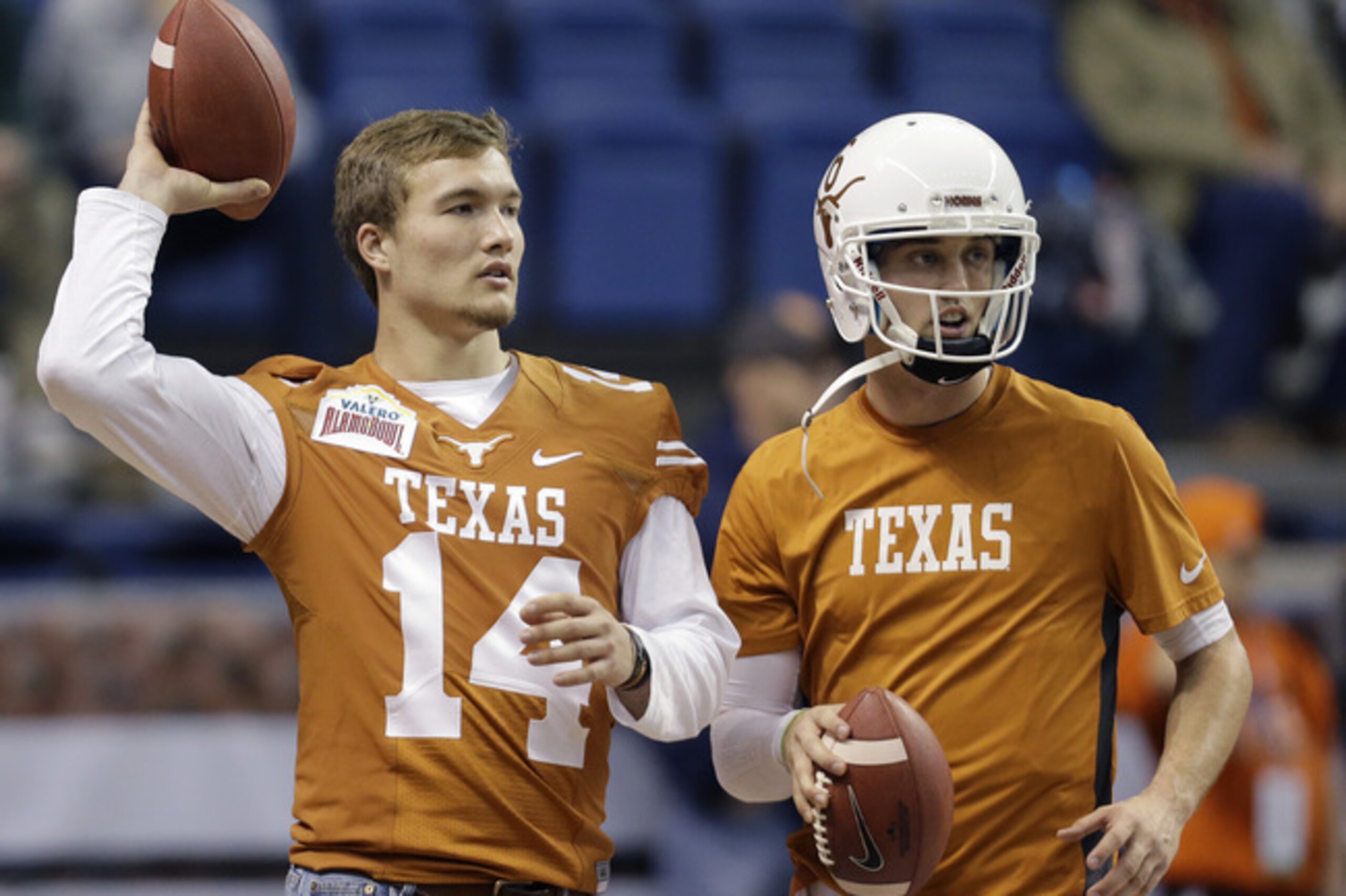 Returning from a significant injury, David Ash (right) gives Texas the ability to stretch the field.