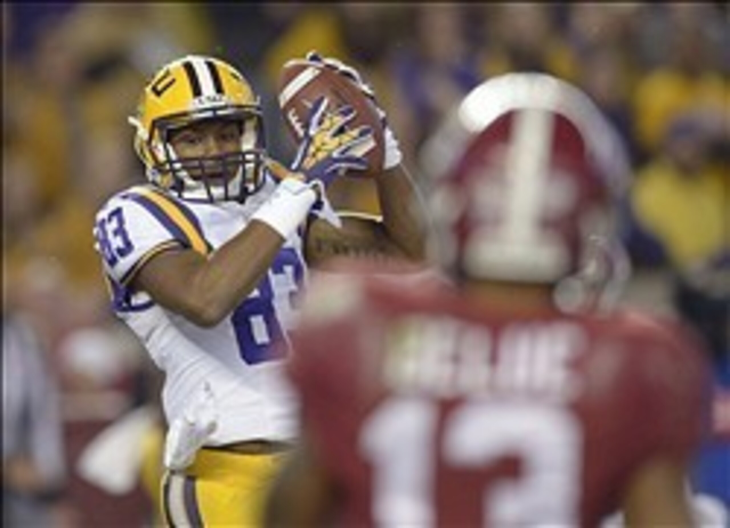 LSU receiver Travin Dural snatches a touchdown reception against Alabama last season. Dural is LSU's top returning wide receiver.