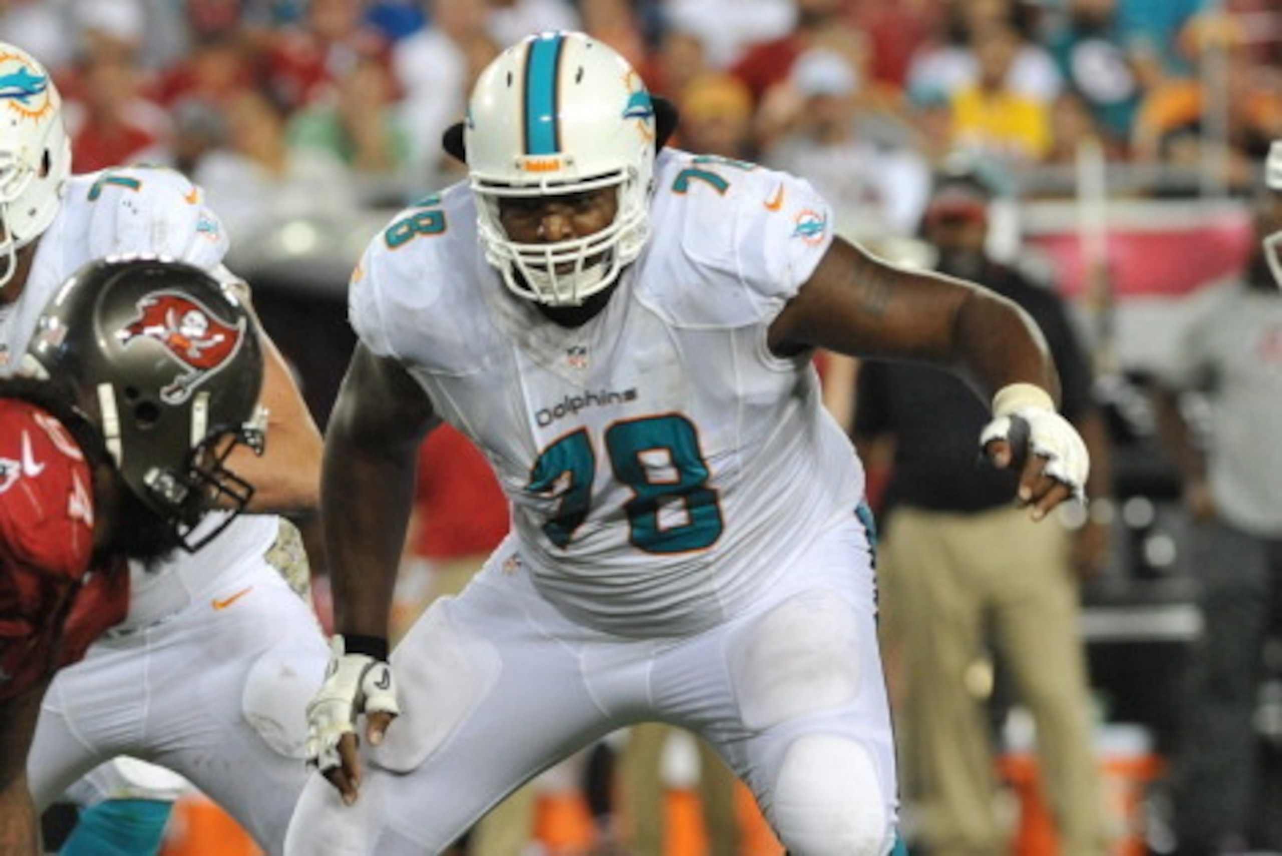TAMPA, FL - NOVEMBER 11:  Tackle Bryant McKinnie #78 of the Miami Dolphins blocks against the Tampa Bay Buccaneers November 11, 2013 at Raymond James Stadium in Tampa, Florida. Tampa won 22 - 19. (Photo by Al Messerschmidt/Getty Images)