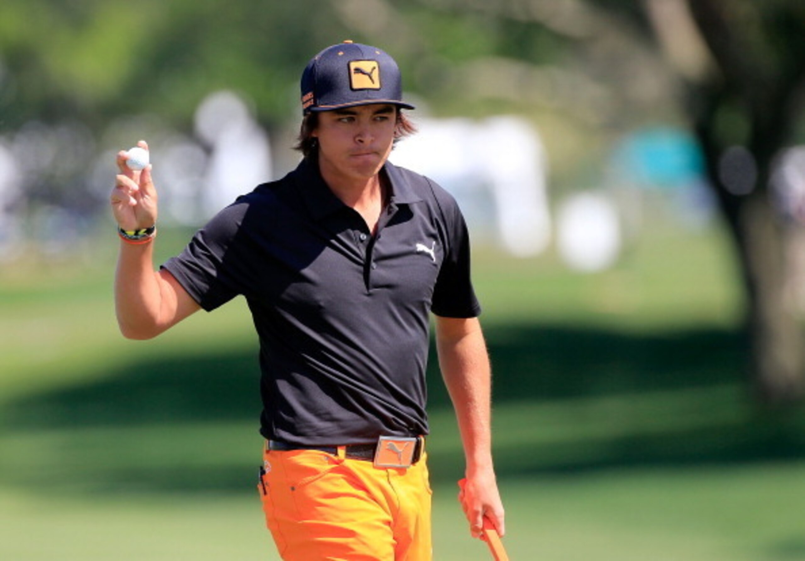 Rickie Fowler, with his longer hair, was in contention last year, but couldn't catch Tiger Woods.