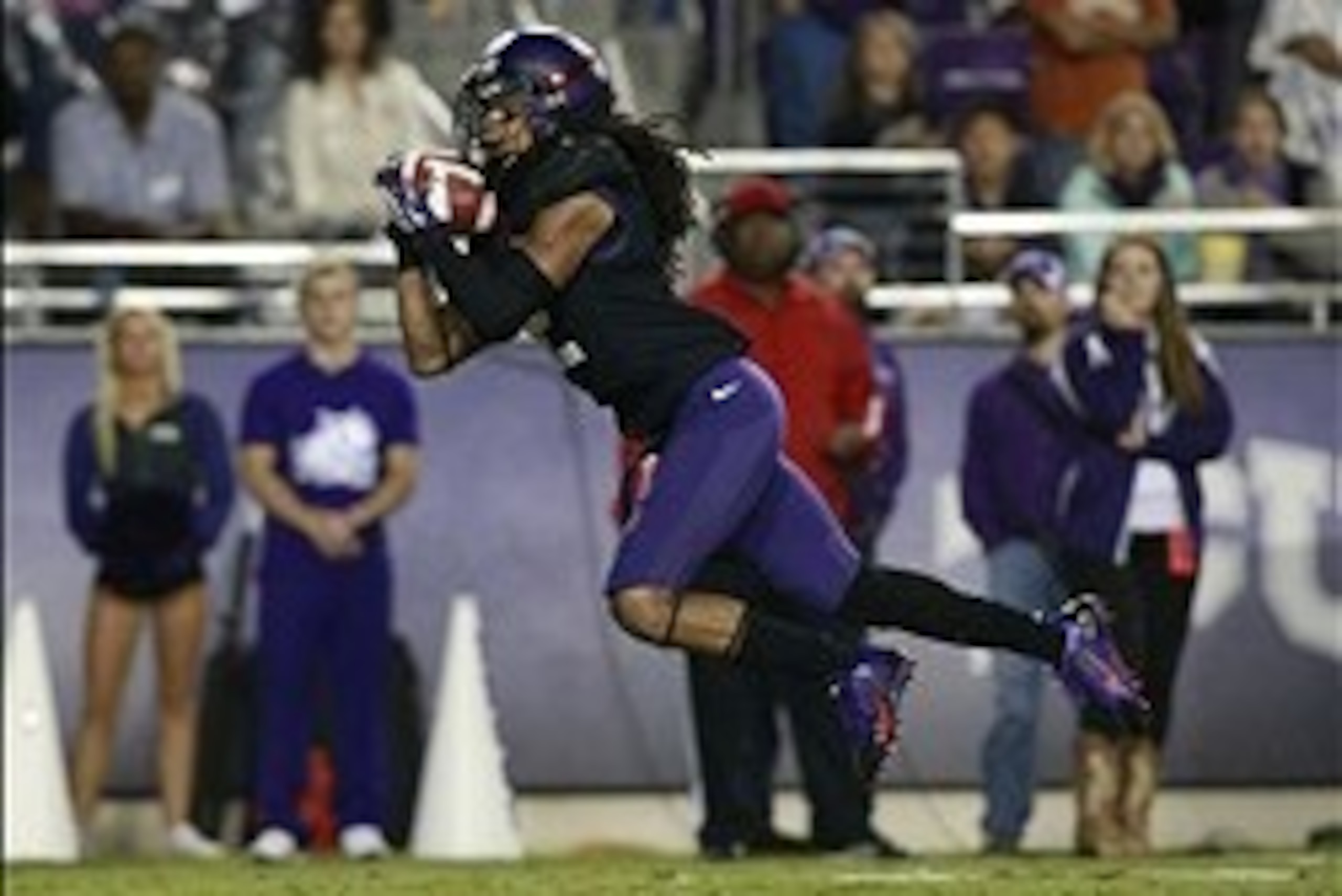 Oct 26, 2013; Fort Worth, TX, USA; TCU Horned Frogs cornerback Jason Verrett (2) intercepts a pass in the third quarter of the game against the Texas Longhorns at Amon G. Carter Stadium. Mandatory Credit: Tim Heitman-USA TODAY Sports