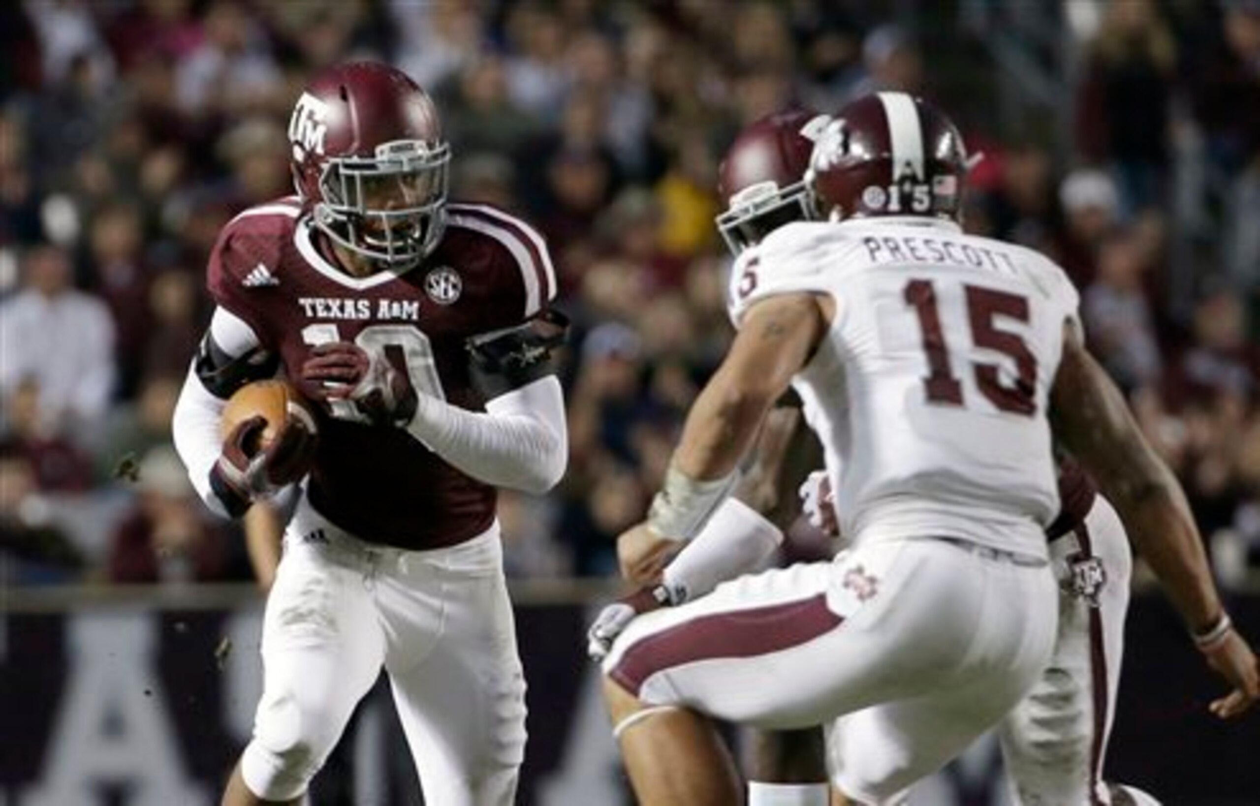 Aggie DE Daeshon Hall returns an interception against Mississippi State