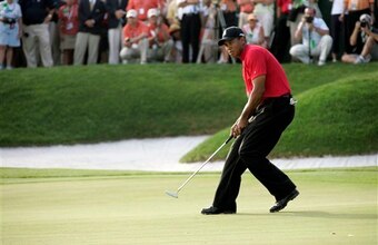 Tiger Woods followed the winning putt to the hole in 2008.