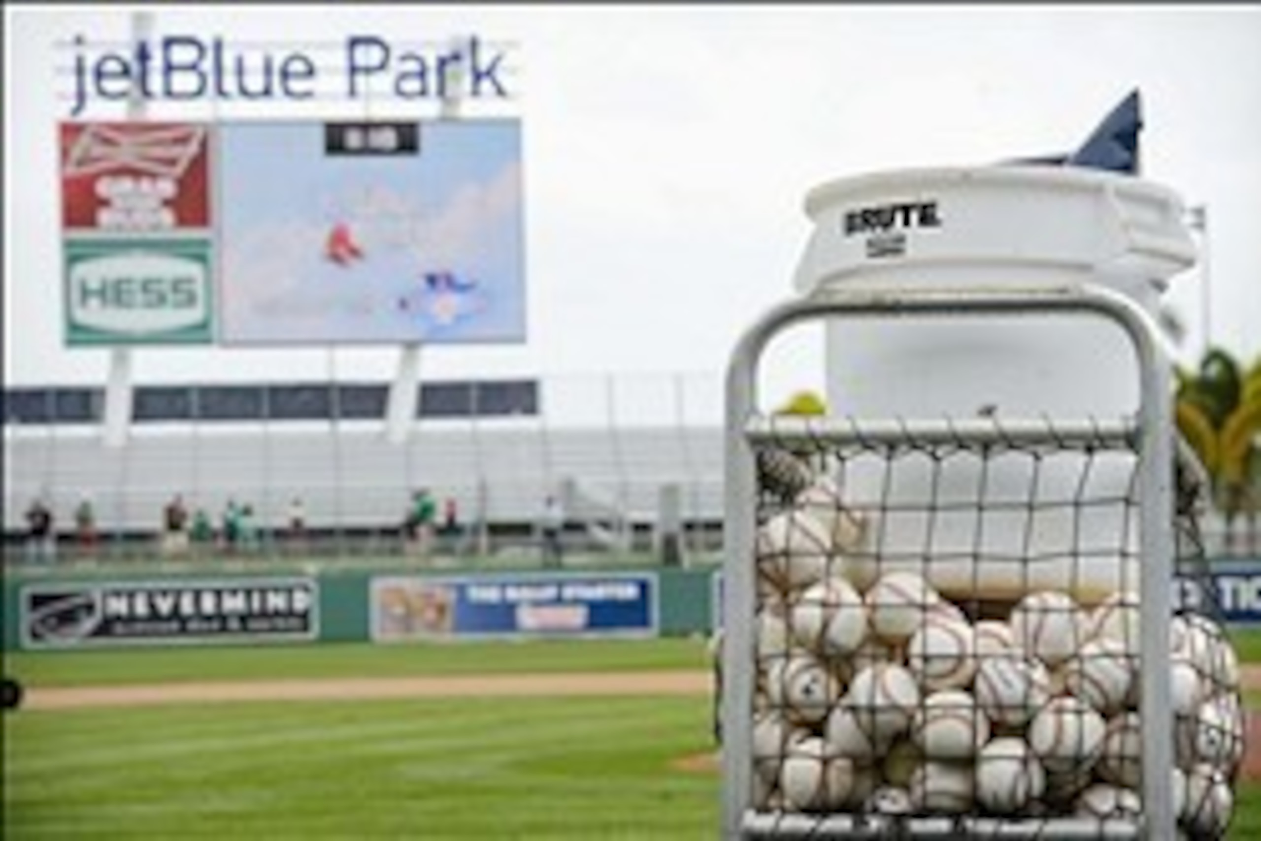 A basket of balls awaits pregame warm-ups at JetBlue Park, spring home of the Red Sox.