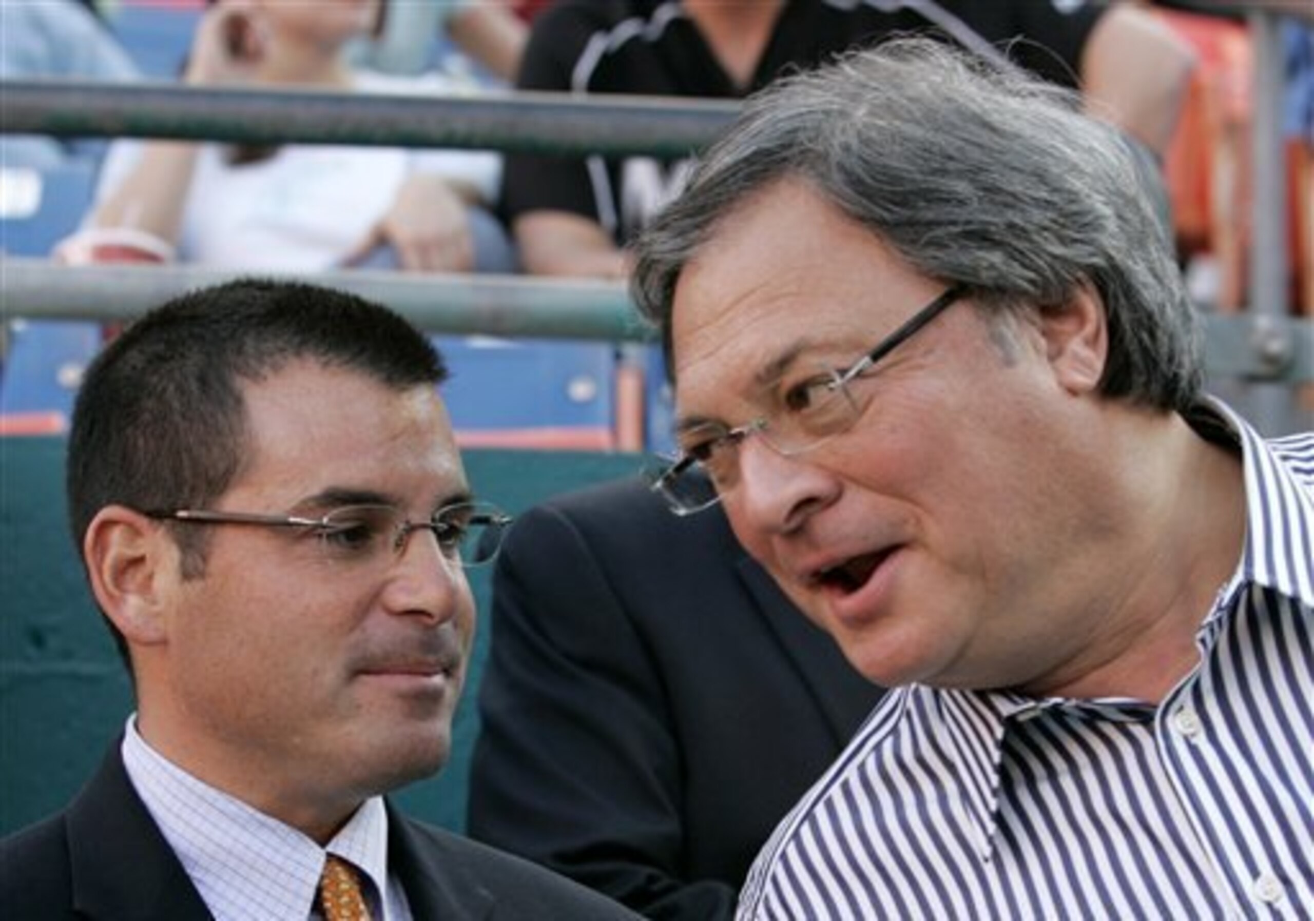 As a friendly reminder, less of team president David Samson, left, and owner Jeffrey Loria is a good thing for the Marlins.