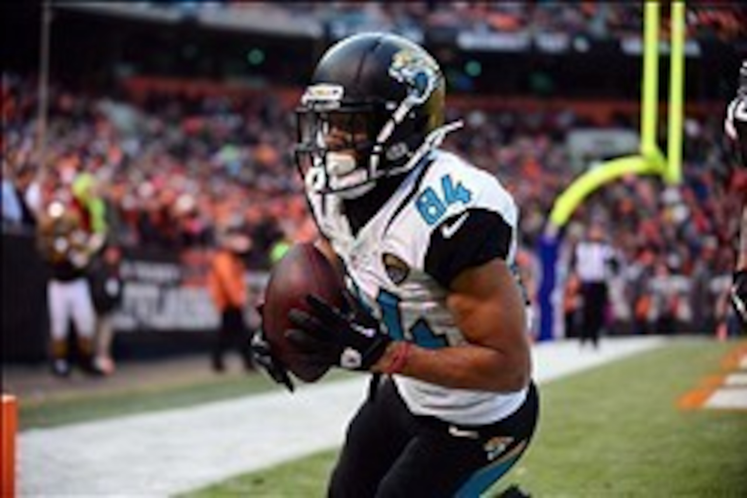 Dec 1, 2013; Cleveland, OH, USA; Jacksonville Jaguars wide receiver Cecil Shorts (84) catches the game winning pass in the end zone while being defended by Cleveland Browns cornerback Joe Haden (23) in the fourth quarter at FirstEnergy Stadium. Mandatory 