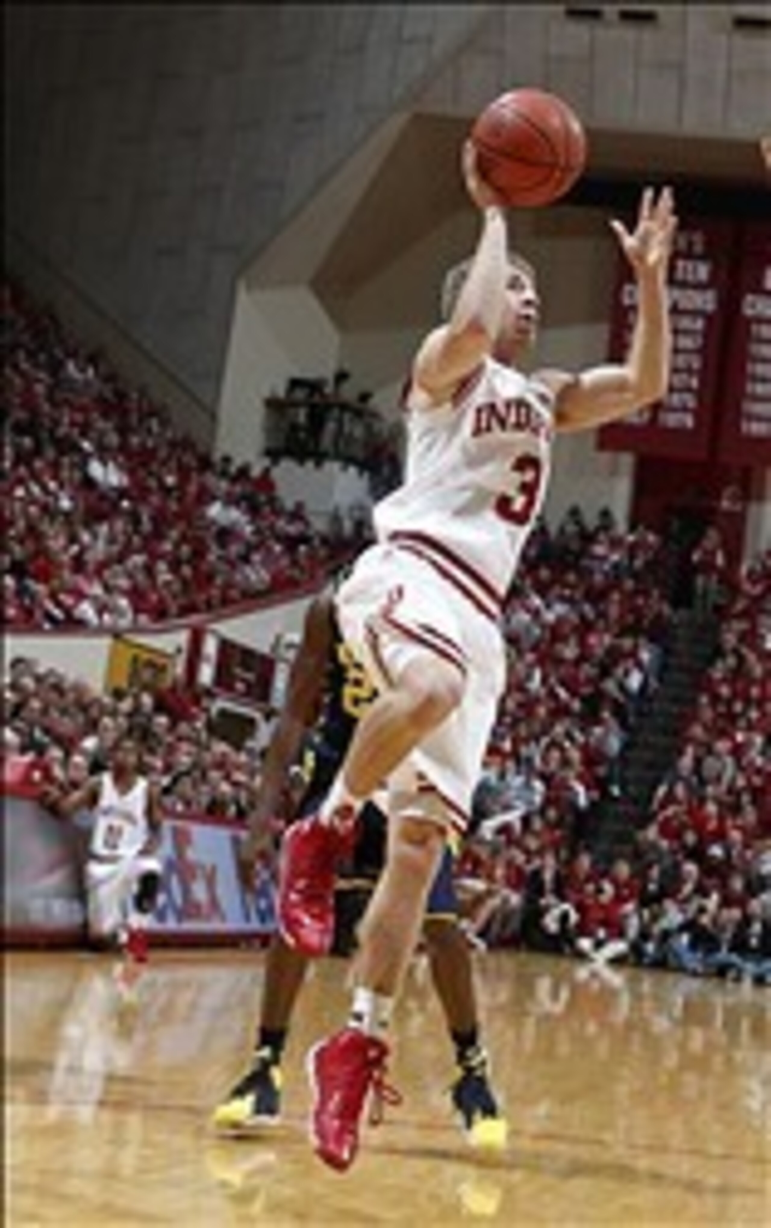 Feb 2, 2014; Bloomington, IN, USA; Indiana Hoosiers guard Jonny Marlin (3) takes a shot against the Michigan Wolverines at Assembly Hall. Mandatory Credit: Brian Spurlock-USA TODAY Sports