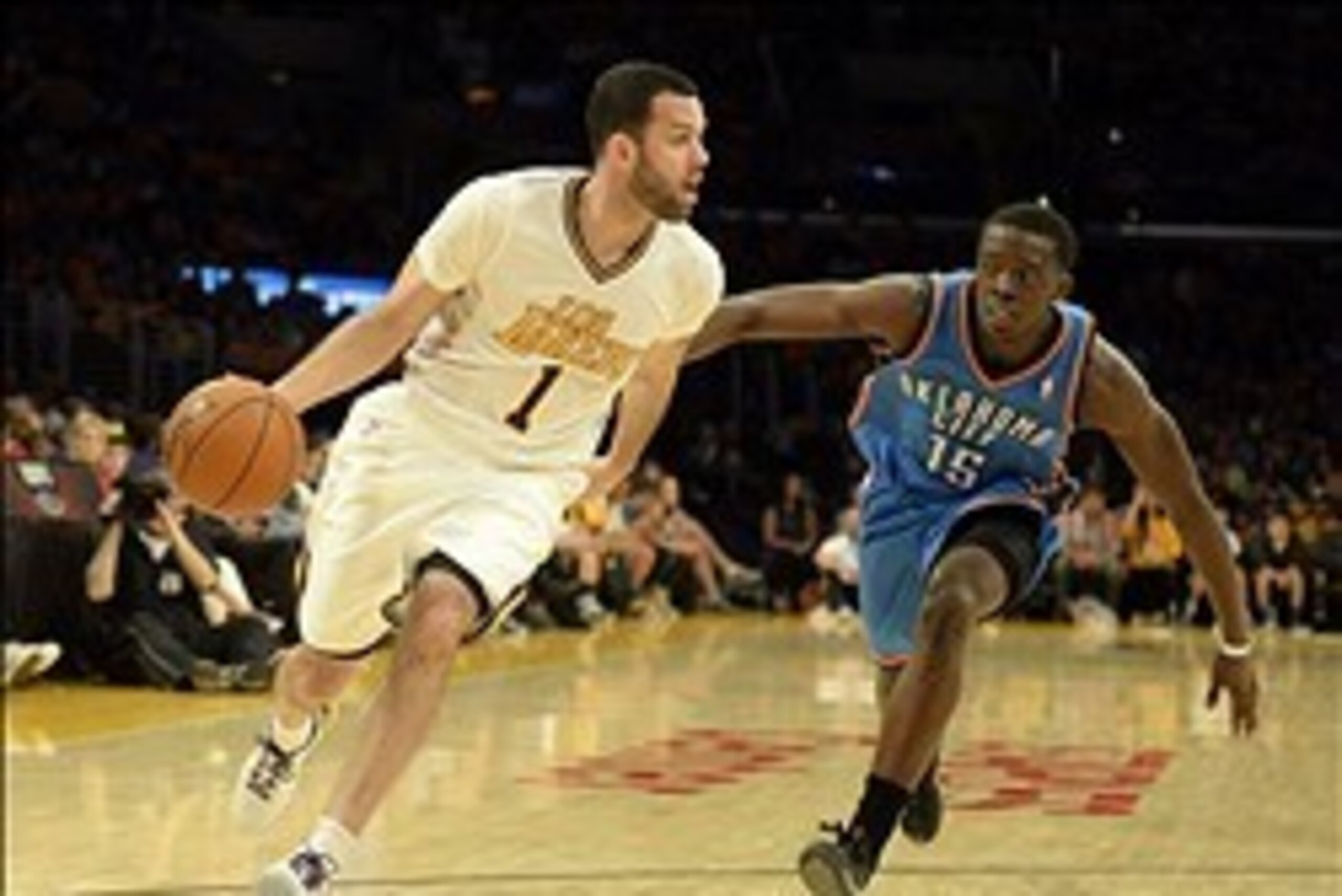 Mar 9, 2014; Los Angeles, CA, USA; Los Angeles Lakers point guard Jordan Farmar (1) drives against Oklahoma City Thunder point guard Reggie Jackson (15) during the second half at Staples Center. Mandatory Credit: Richard Mackson-USA TODAY Sports