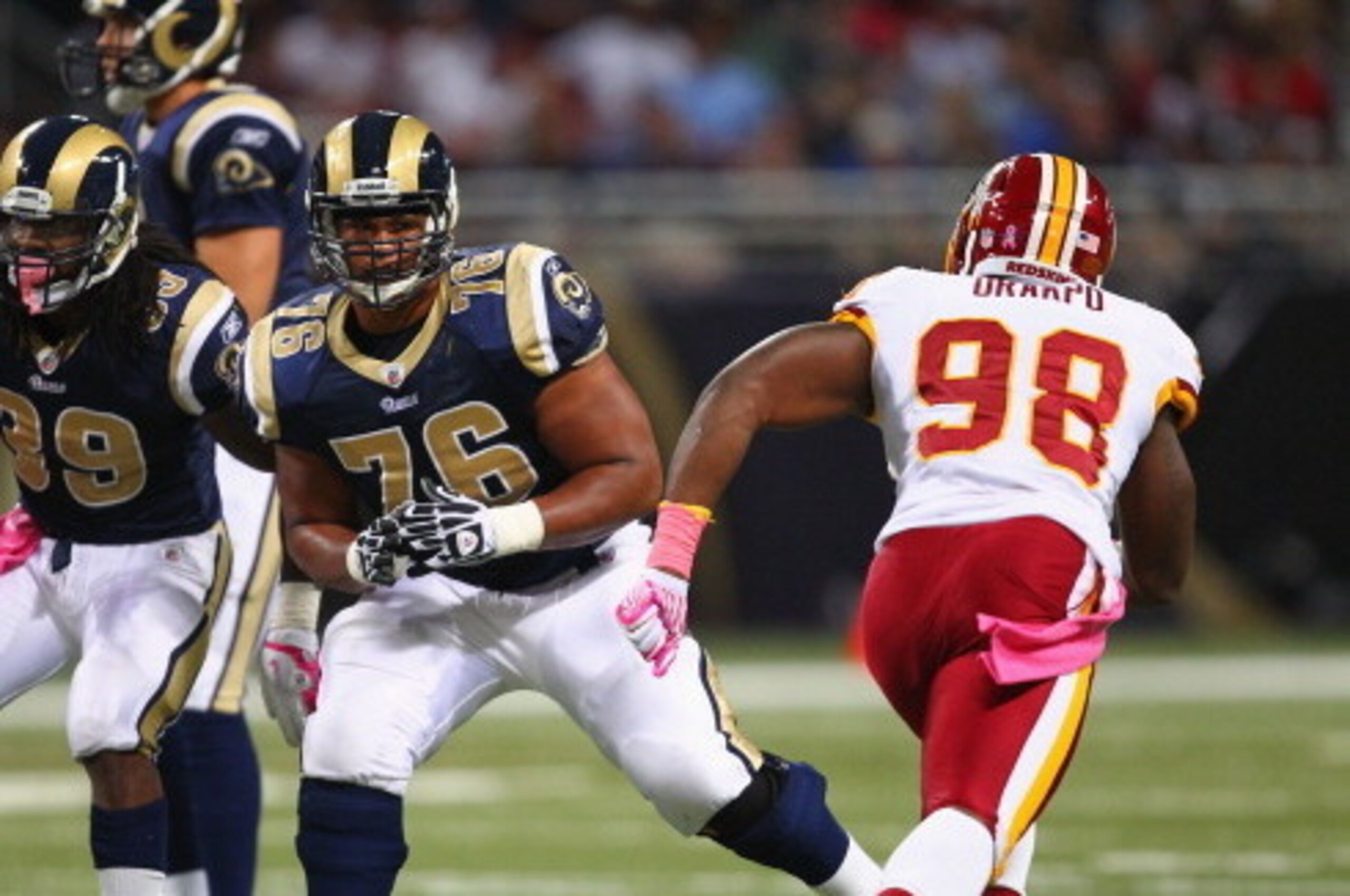 ST. LOUIS, MO - OCTOBER 02: Rodger Saffold #76 of the St. Louis Rams blocks against the Washington Redskins at the Edward Jones Dome on October 2, 2011 in St. Louis, Missouri.  The Washington Redskins beat the St. Louis Rams 17-10.  (Photo by Dilip Vishwa