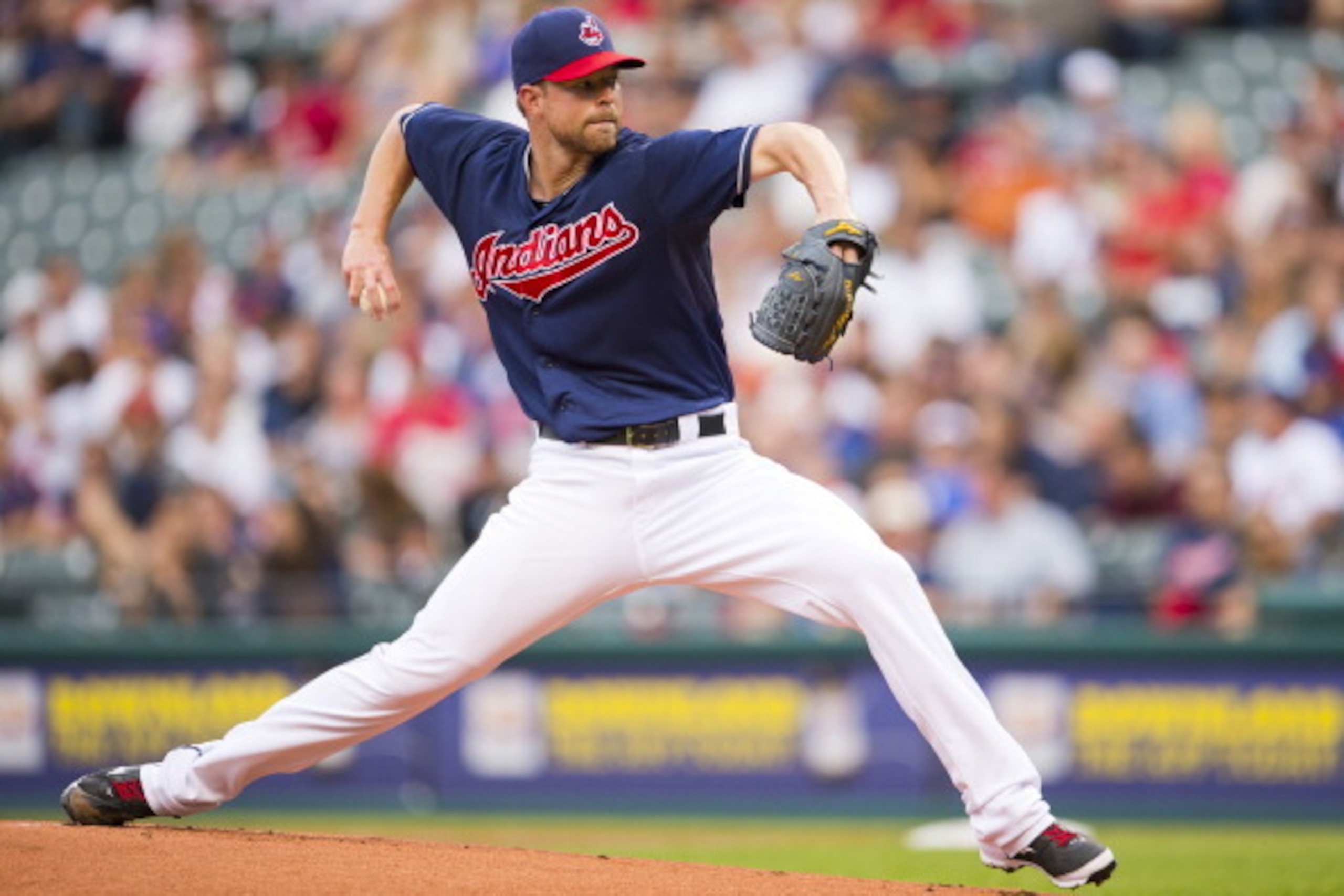 CLEVELAND, OH - SEPTEMBER 7: Starting pitcher Corey Kluber #28 of the Cleveland Indians pitches during the first inning against the New York Mets at Progressive Field on September 7, 2013 in Cleveland, Ohio. (Photo by Jason Miller/Getty Images)