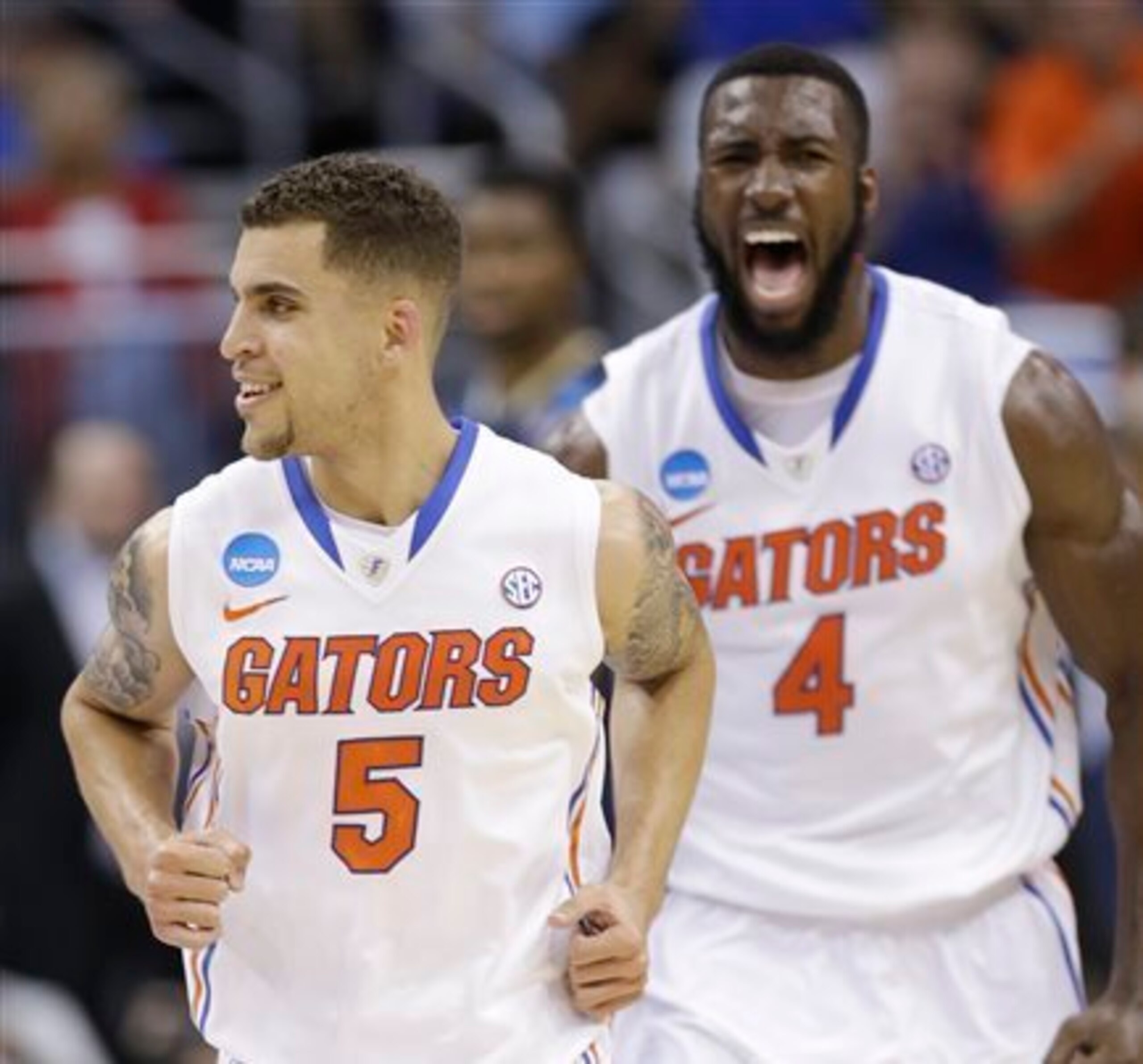 Scottie Wilbekin (L) and Patric Young