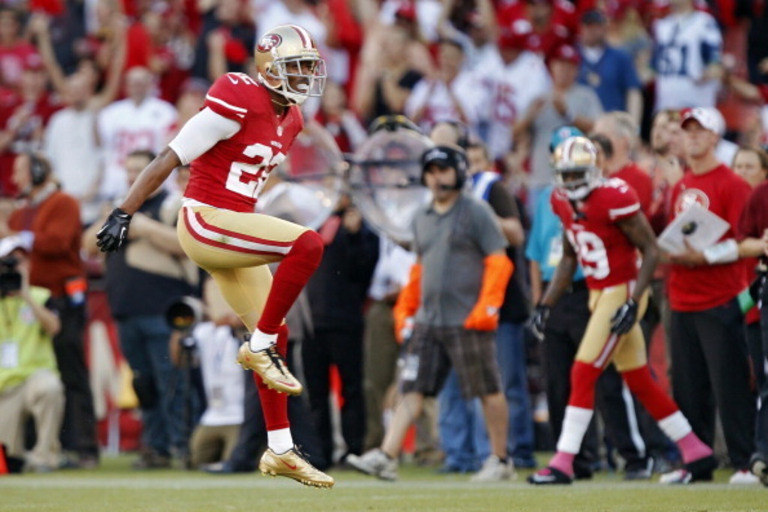 SAN FRANCISCO, CA - OCTOBER 18:  Cornerback Carlos Rogers #22 of the San Francisco 49ers celebrates after almost intercepting a pass and breaking up a play against the Seattle Seahawks in the first quarter on October 18, 2012 at Candlestick Park in San Fr