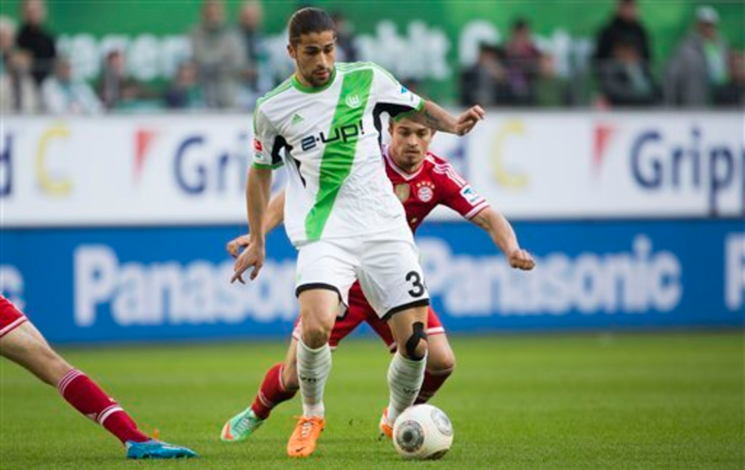 VfL Wolfsburg's Ricardo Rodriguez takes charge against Bayern Munich.