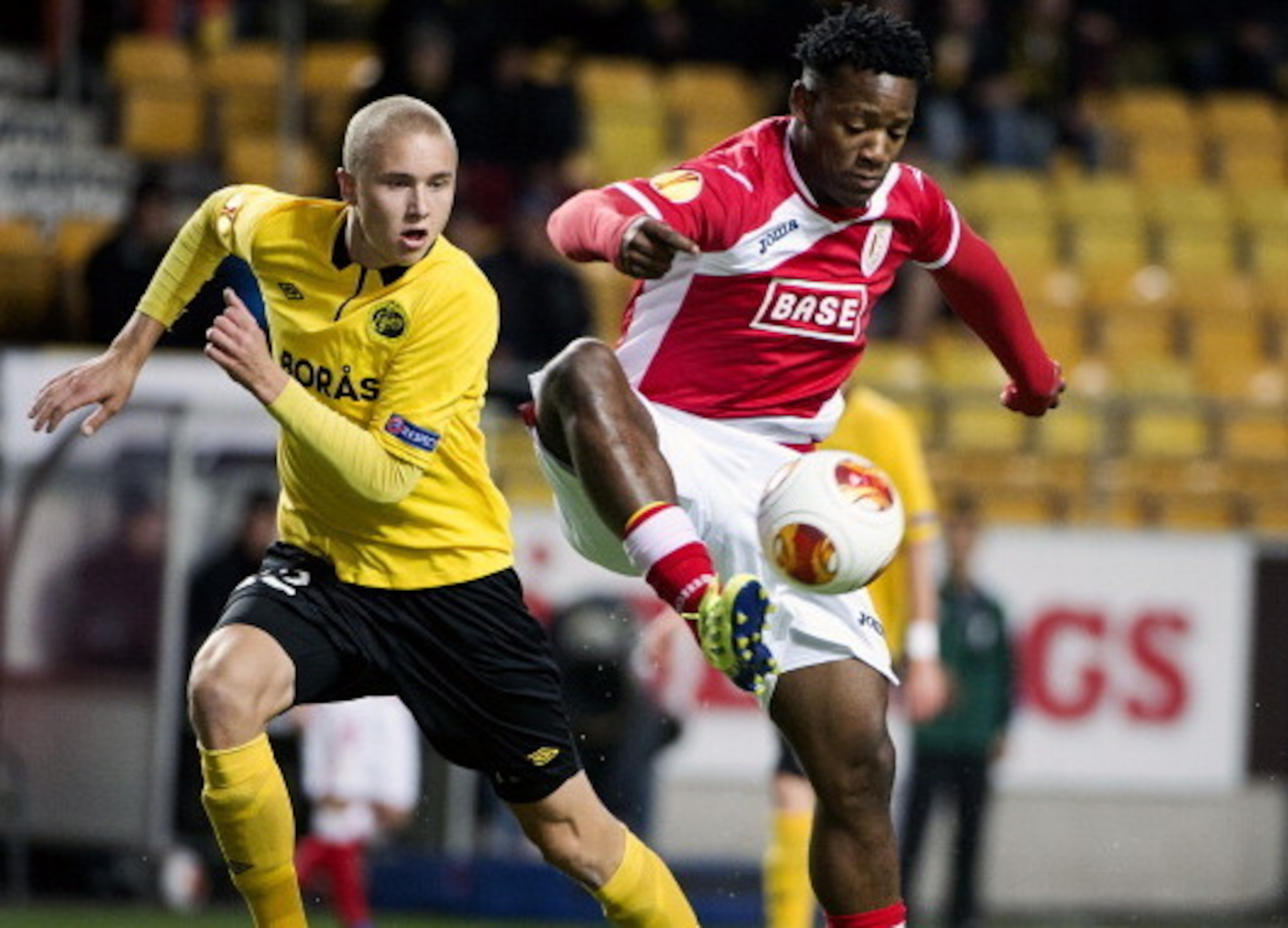 BORAS, SWEDEN - OCTOBER 3:  Sebastian Holmen (L) of IF Elfsborg challenges Michy Batshuayi of R. Standard de Liege during the UEFA Europa League group stage match between IF Elfsborg and R. Standard de Liege held on October 3, 2013 at the Boras Arena, in 