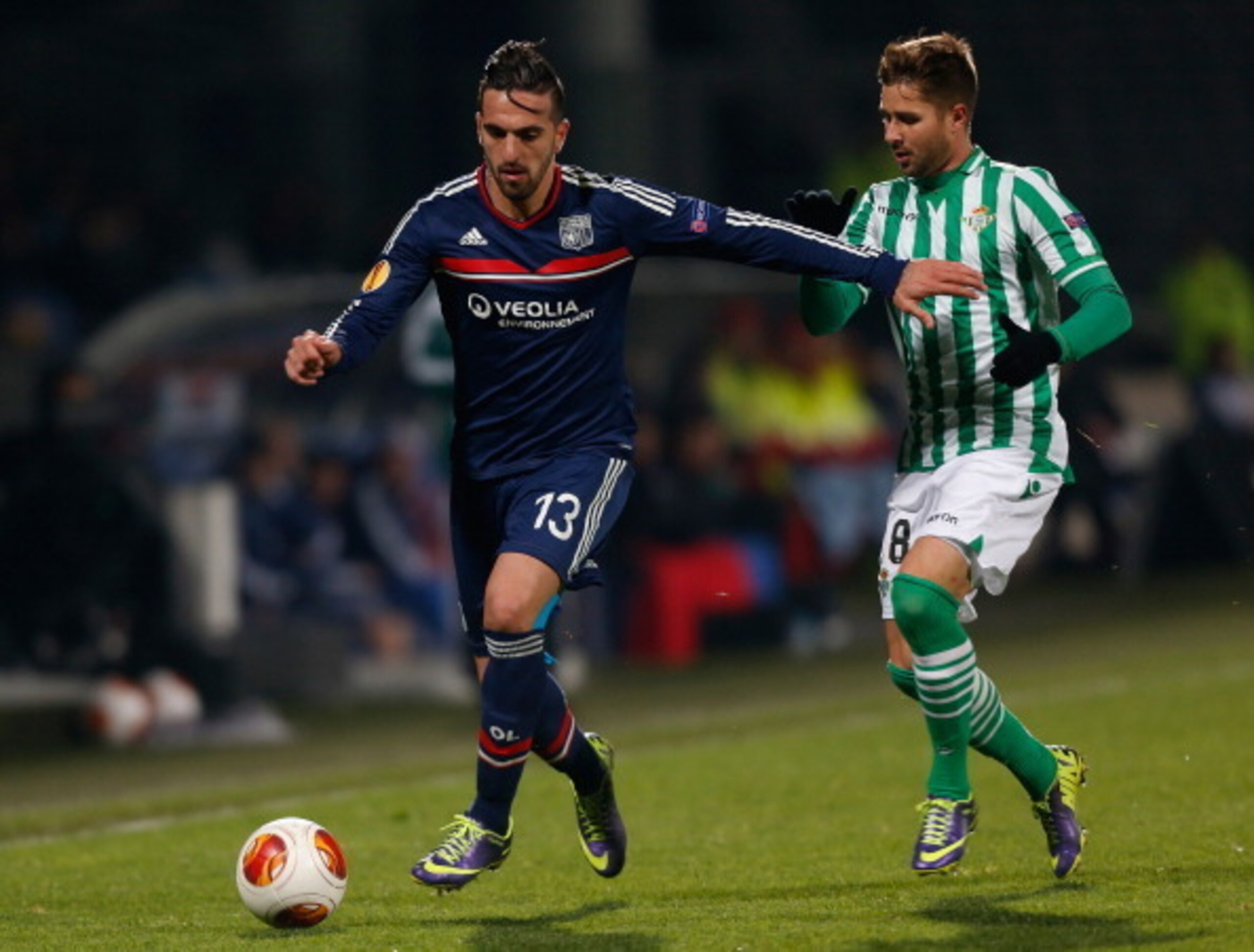 Lyon defender Miguel Lopes plays against Real Betis.