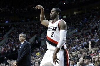 Wesley Matthews strikes a pose after a jump shot. Wesley Matthews strikes a pose after a jump shot.