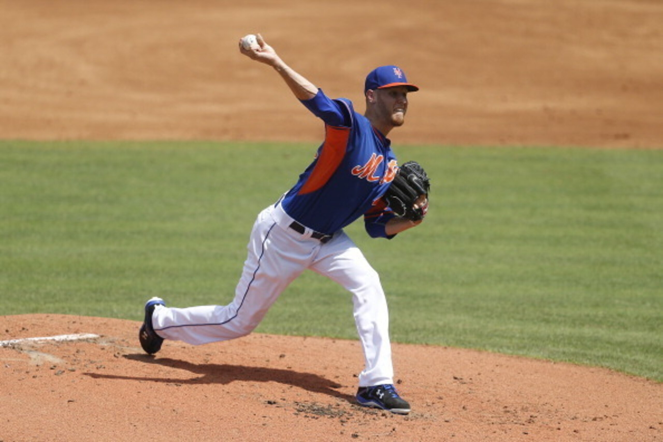 Zack Wheeler winding up for a pitch.