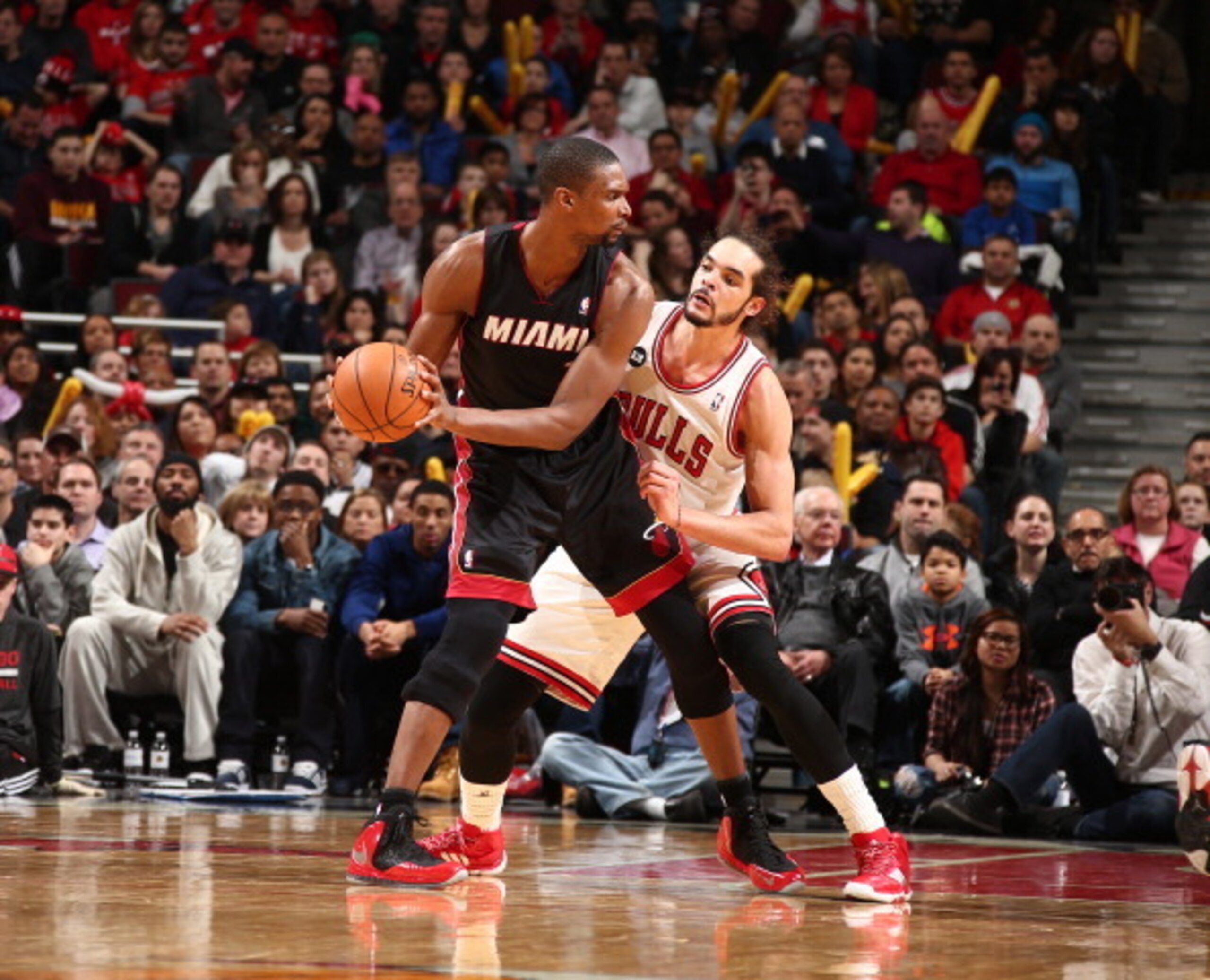 Miami Heat forward Chris Bosh against Chicago Bulls center Joakim Noah