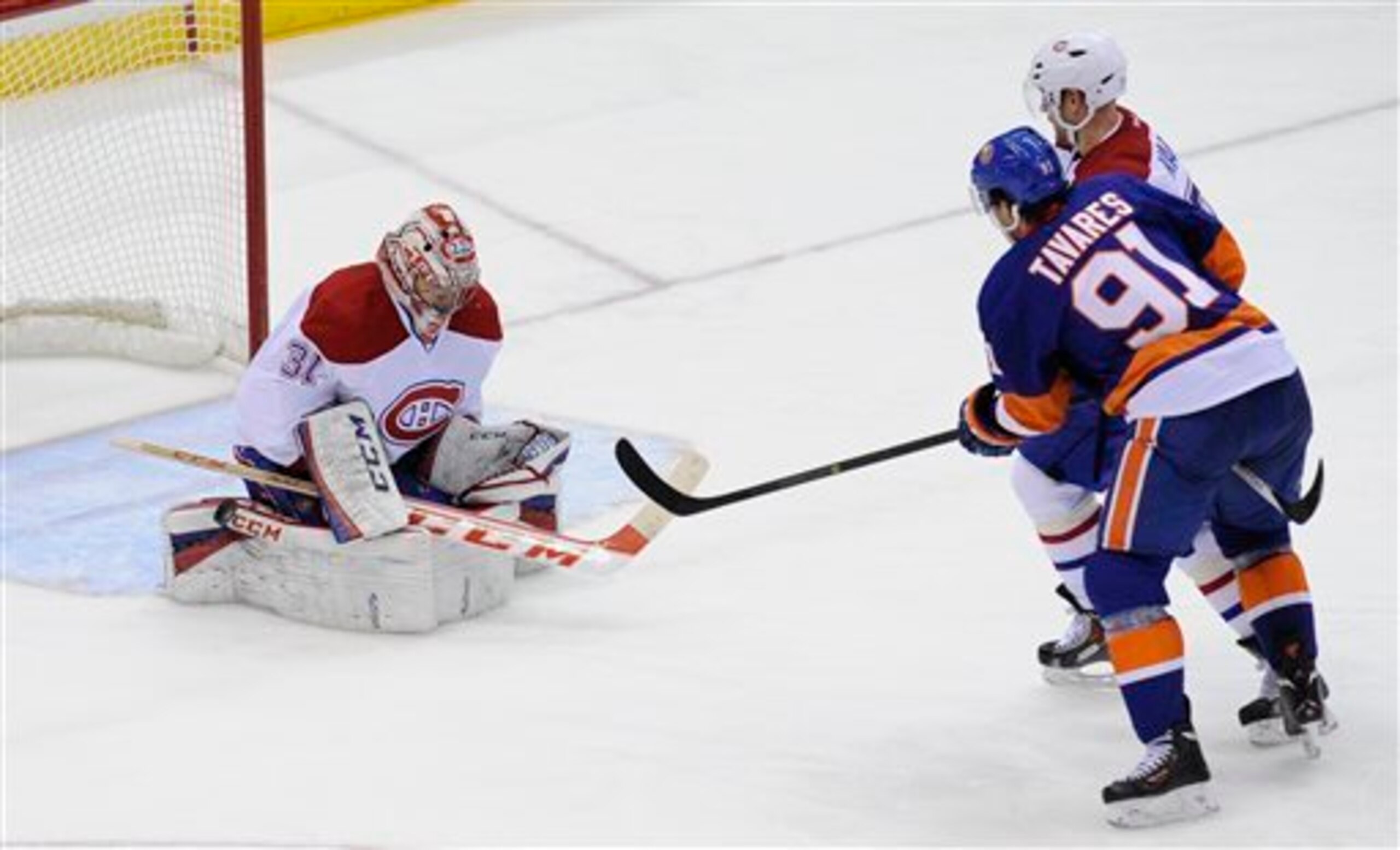 New York Islanders forward John Tavares on Montreal Canadiens goalie Carey Price.