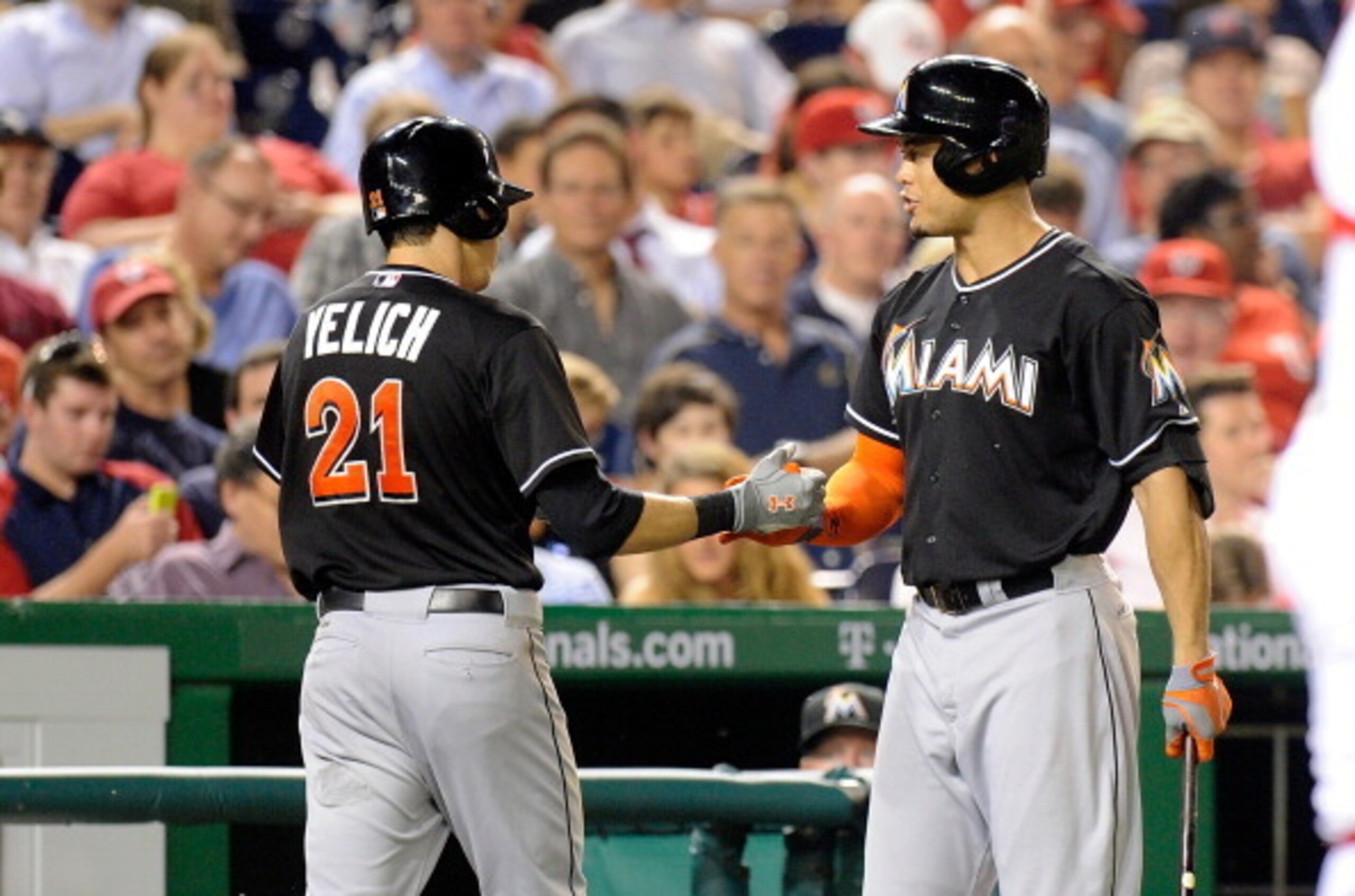 A full season of Christian Yelich, left, and a healthy season from Giancarlo Stanton should immensely help the Marlins offense in 2014.