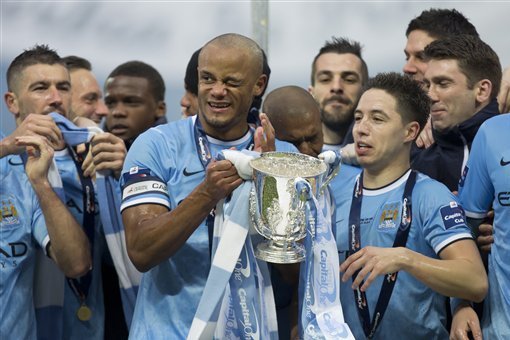 50 Years of Manchester City Home Kits from 1964 to 2014