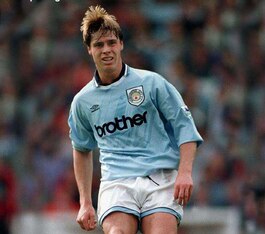 Flitcroft's expression is pained. Maybe he passed a mirror.