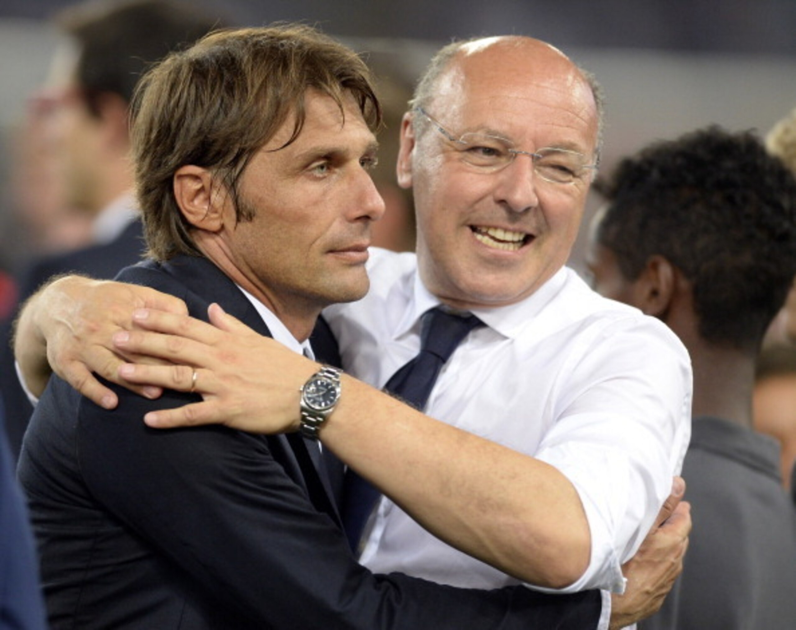 Beppe Marotta celebrates with Antonio Conte after August's Supercoppa victory over Lazio.